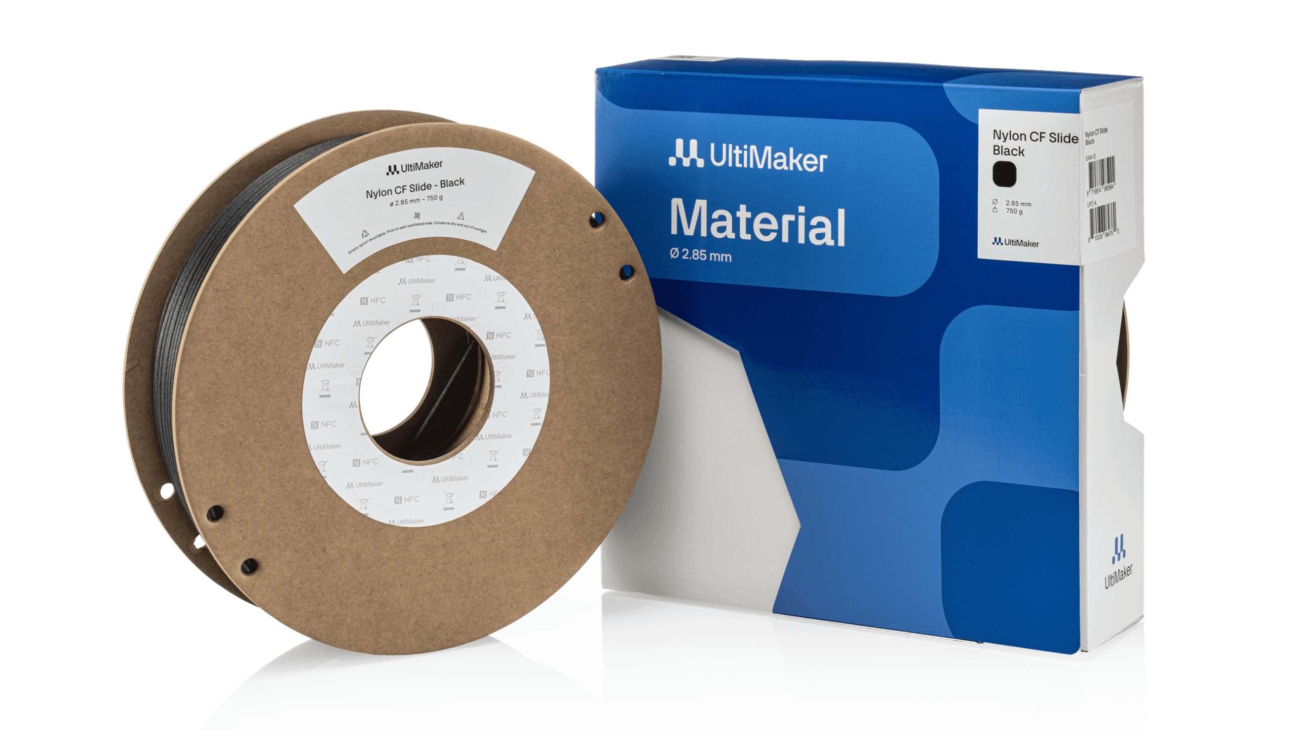 Modern home office setup with a monitor, ergonomic chair, keyboard, and indoor plants near a window with blinds.