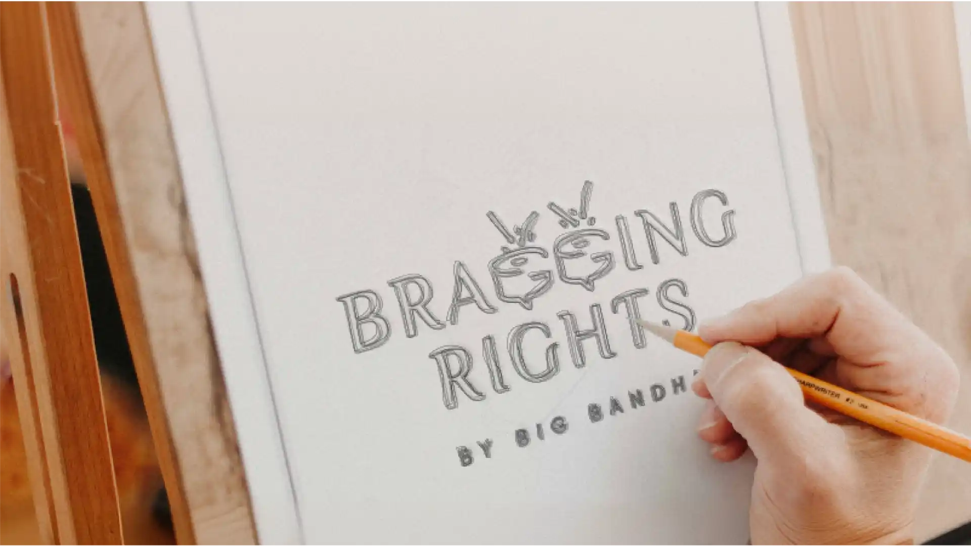 Hand sketching the Bragging Rights logo