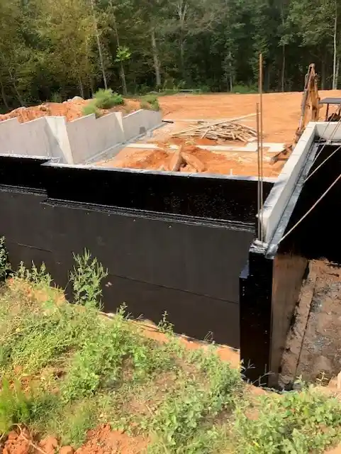 Rub-R-Board drainage board on the exterior of a new home foundation