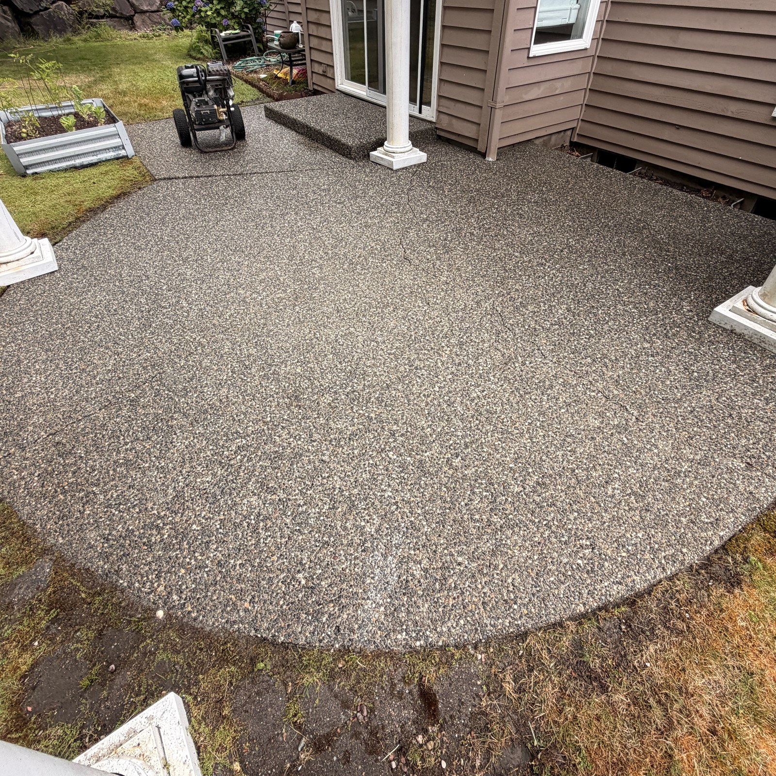 After: round back patio pressure washing by Peterson Property Services in Bothell, WA