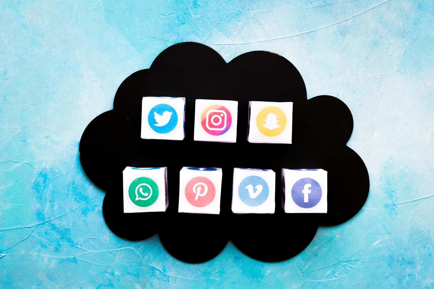  Social media icons arranged on a cloud background, symbolizing digital connectivity and online communication.