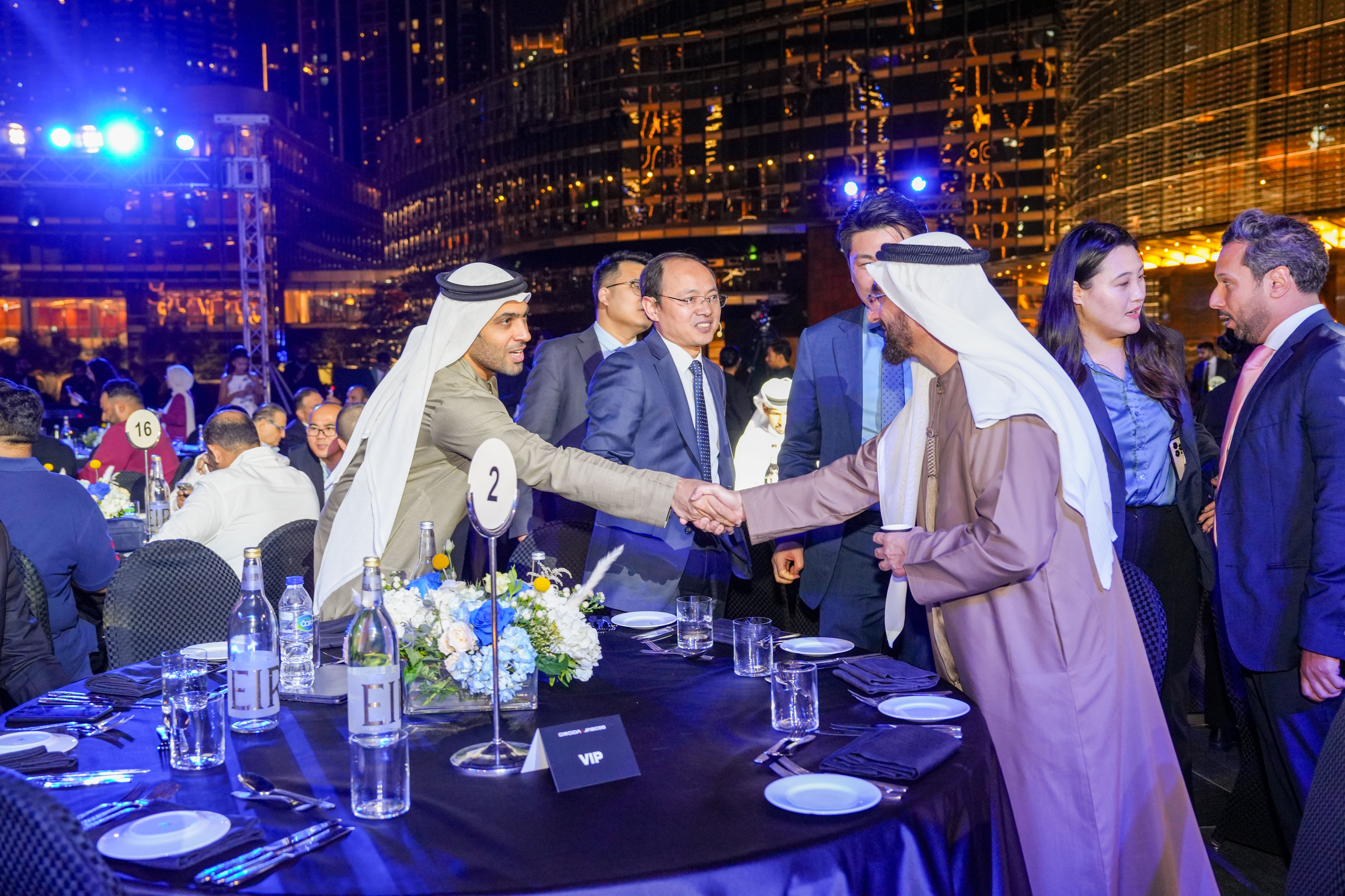 Close-up abstract image of translucent gel or oil bubbles suspended in liquid, creating a scientific and artistic texture.