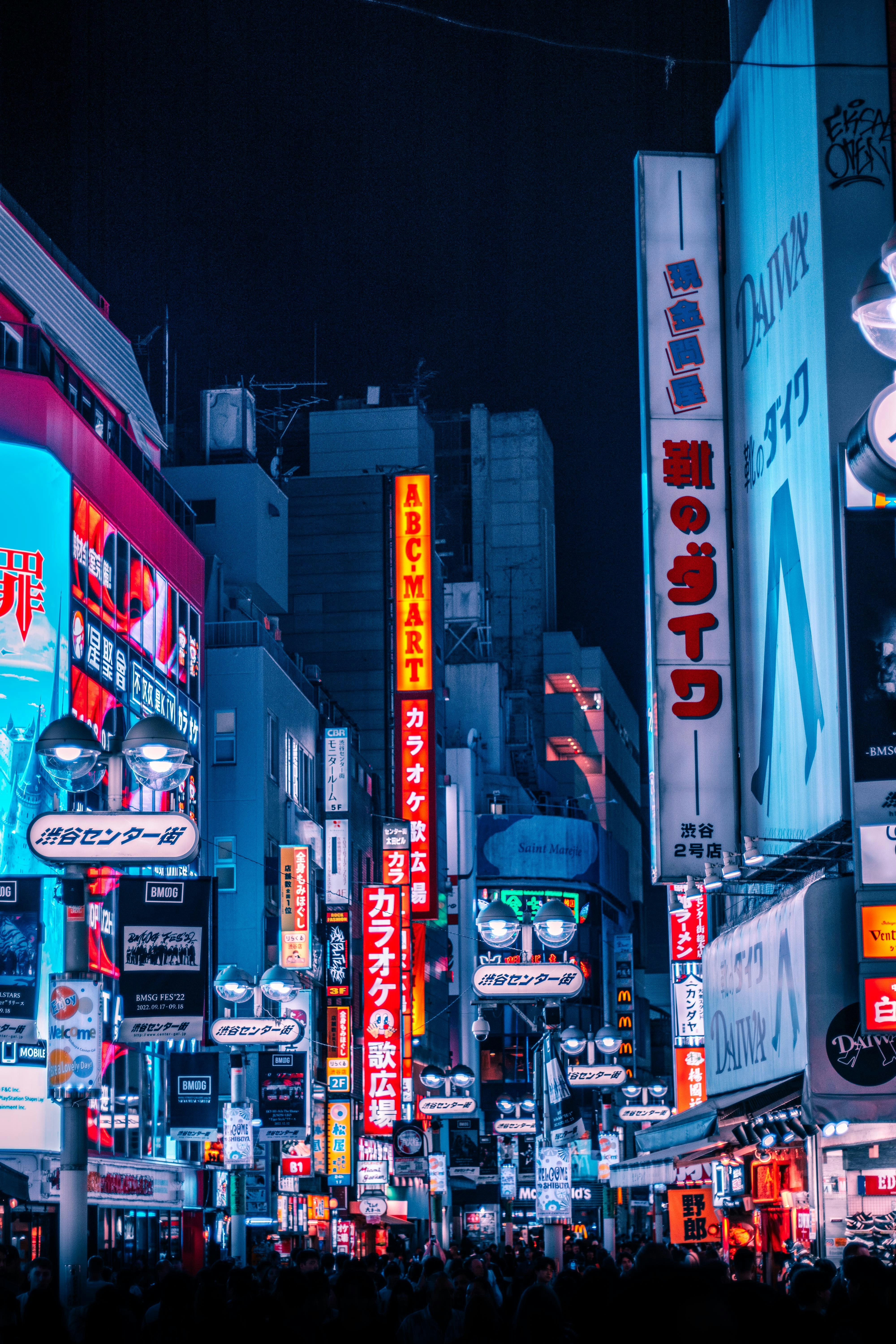 Overwhelming cluster of neon ads in Tokyo, representing the high-volume, low-impact content environment brands drown in without strong creative ideas.