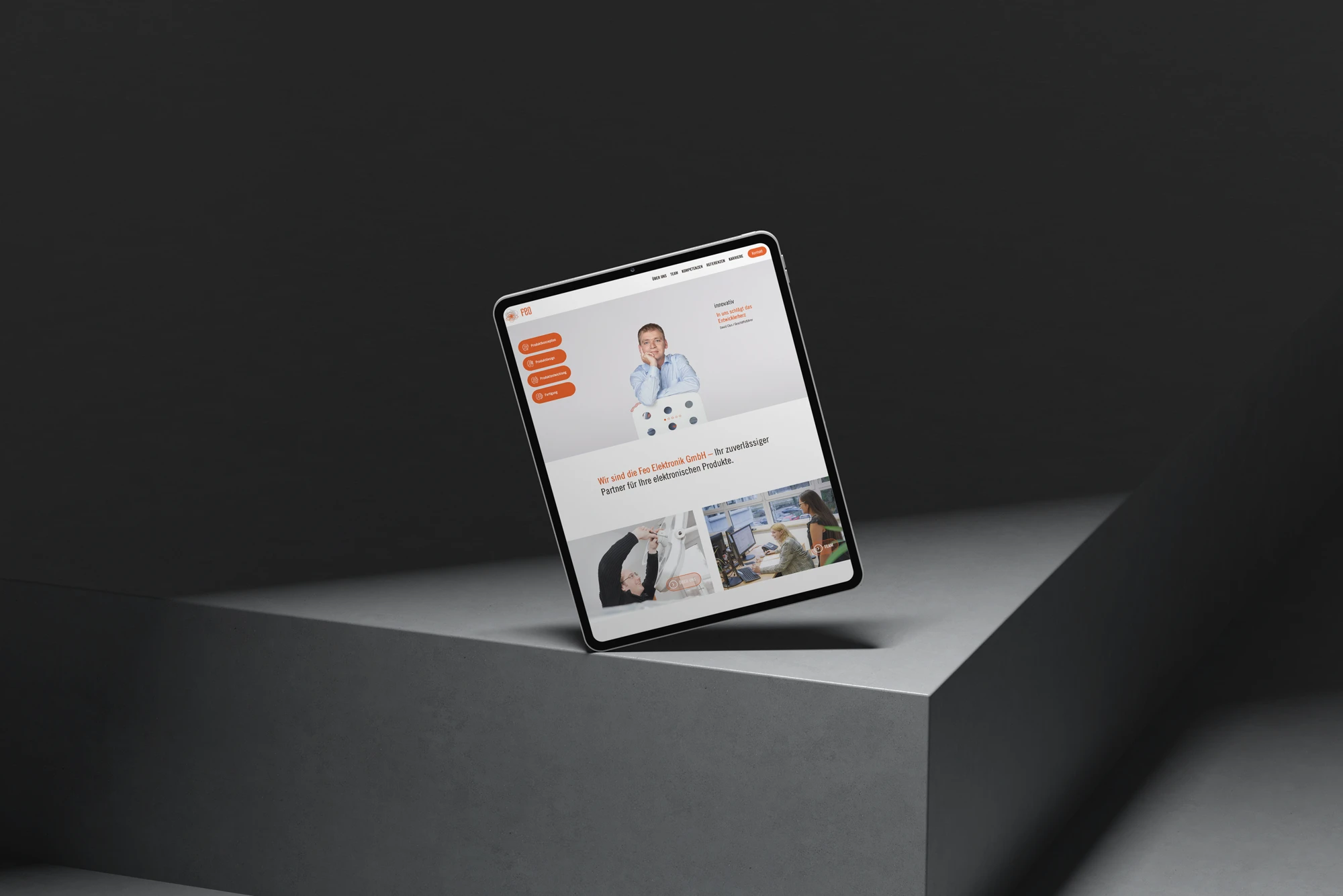 Die Website der feo Elektronik GmbH wird auf einem Tablet dargestellt. Die Startseite zeigt Informationen zu Elektronikentwicklung, Produktdesign und Fertigung in einem modernen, professionellen Layout.