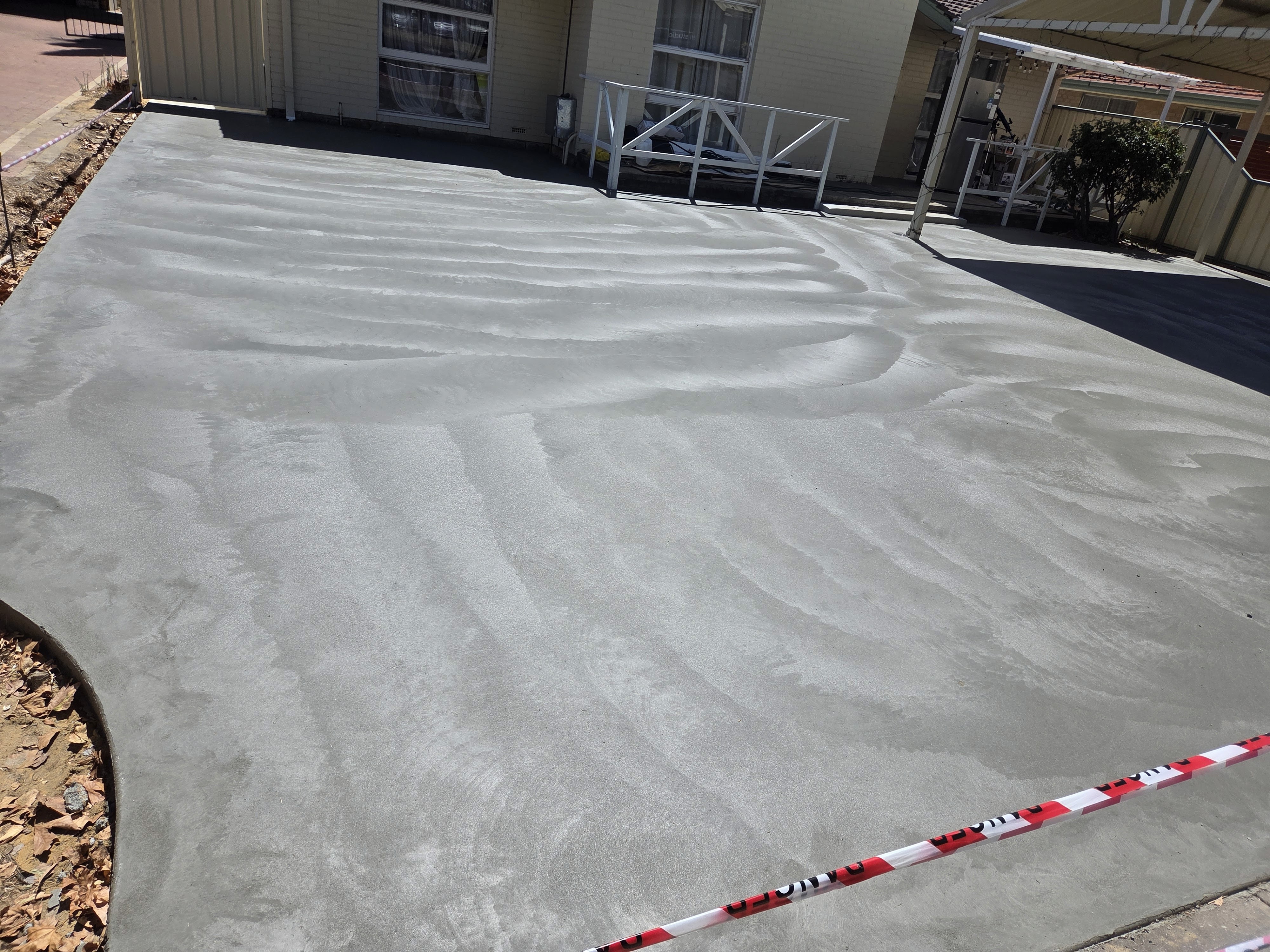 Rachel, personal trainer, looking to the side confidently in a fitness studio