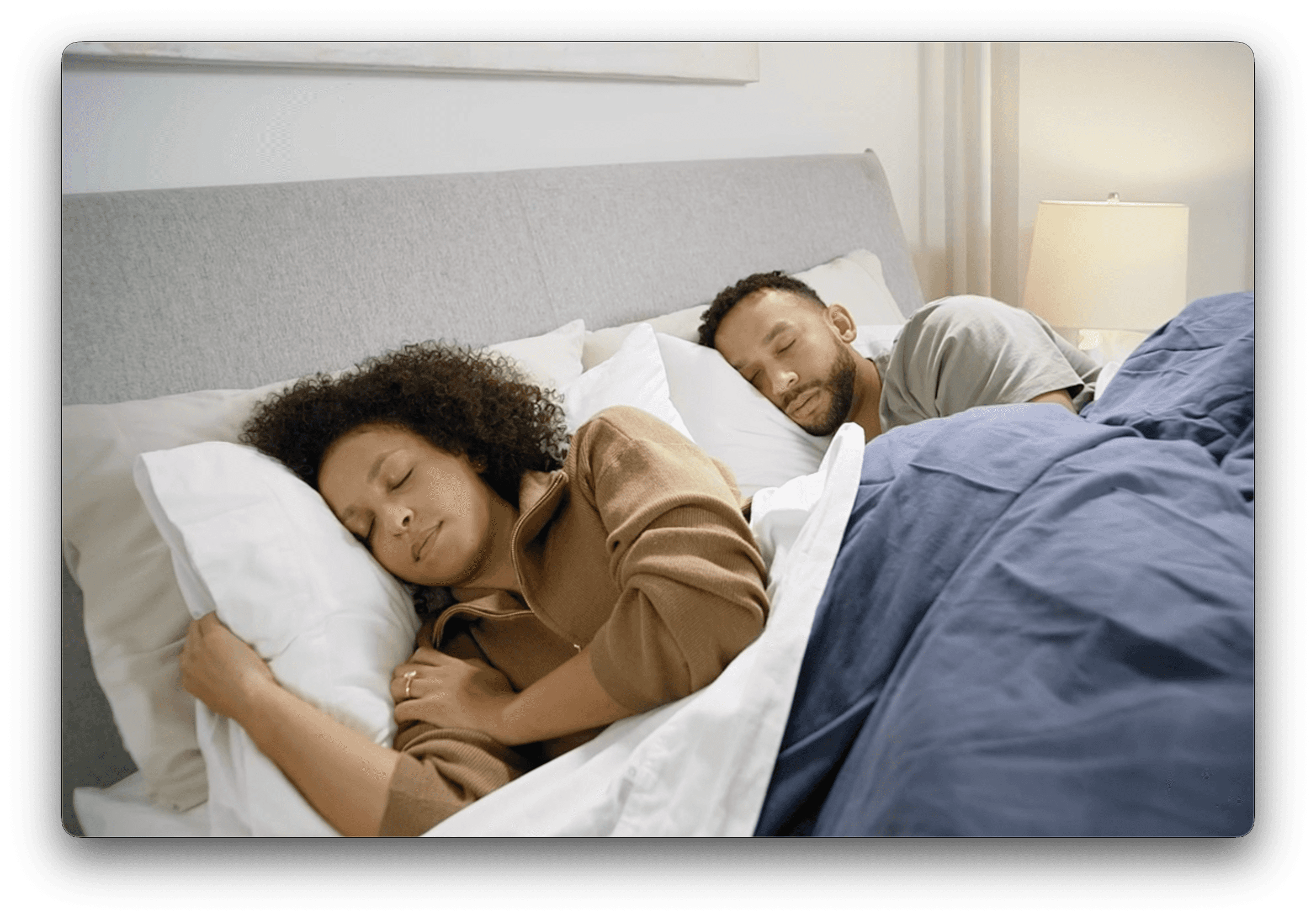 Young man in black leather double-breasted jacket jeans looking at the bottom