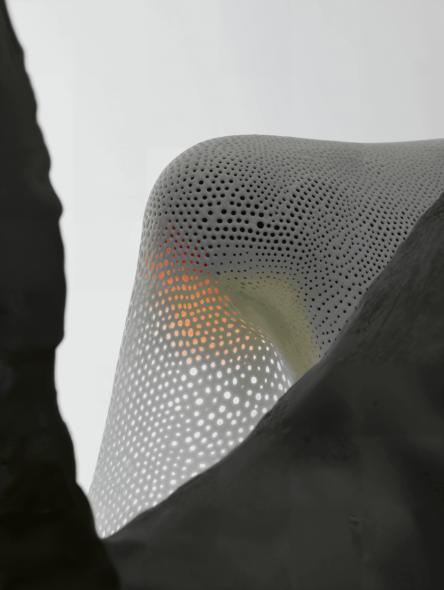 A white chair adorned with orange dots, showcasing a modern and playful design.