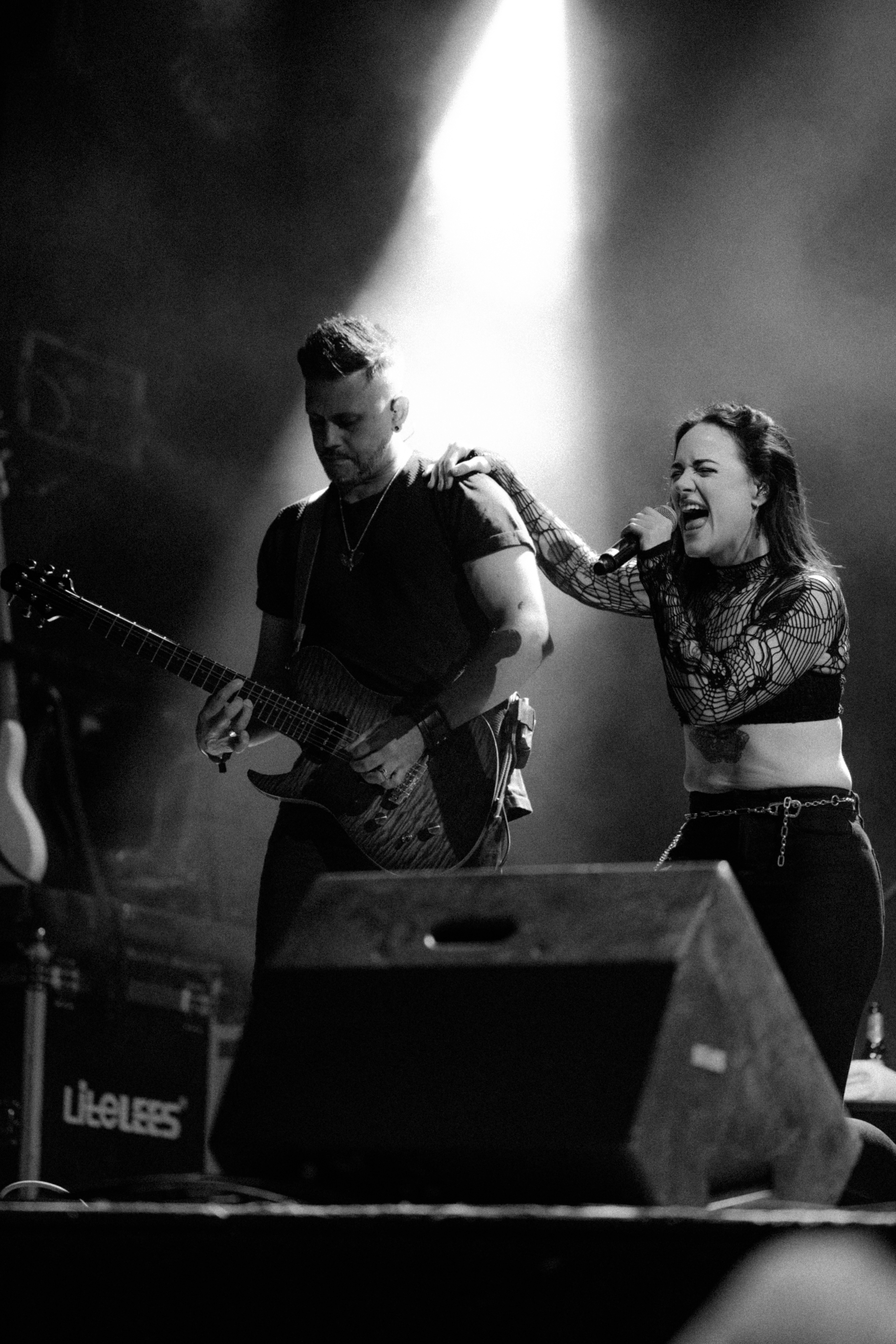 Elegant couple on cliff