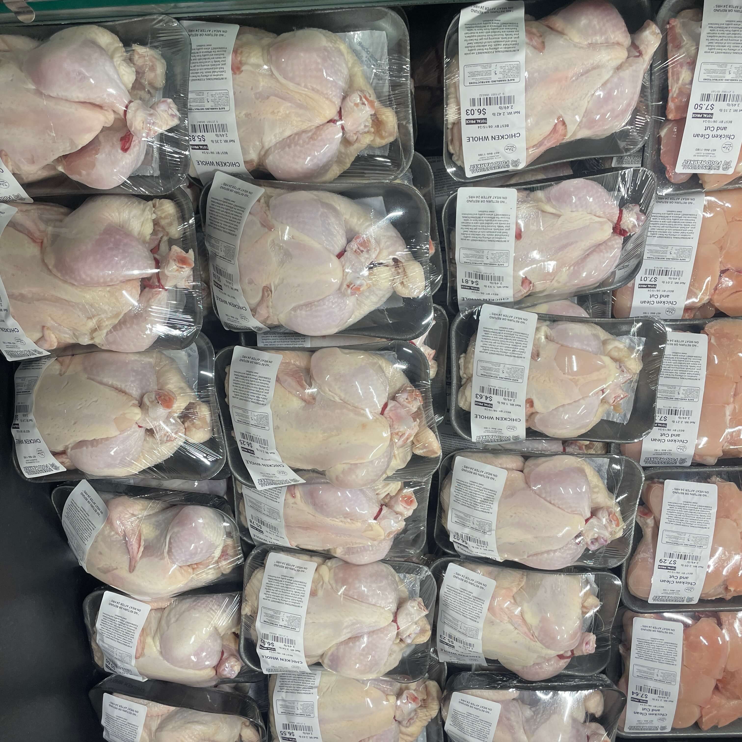 Whole chicken packs at International Food Market Orlando’s halal meat section.