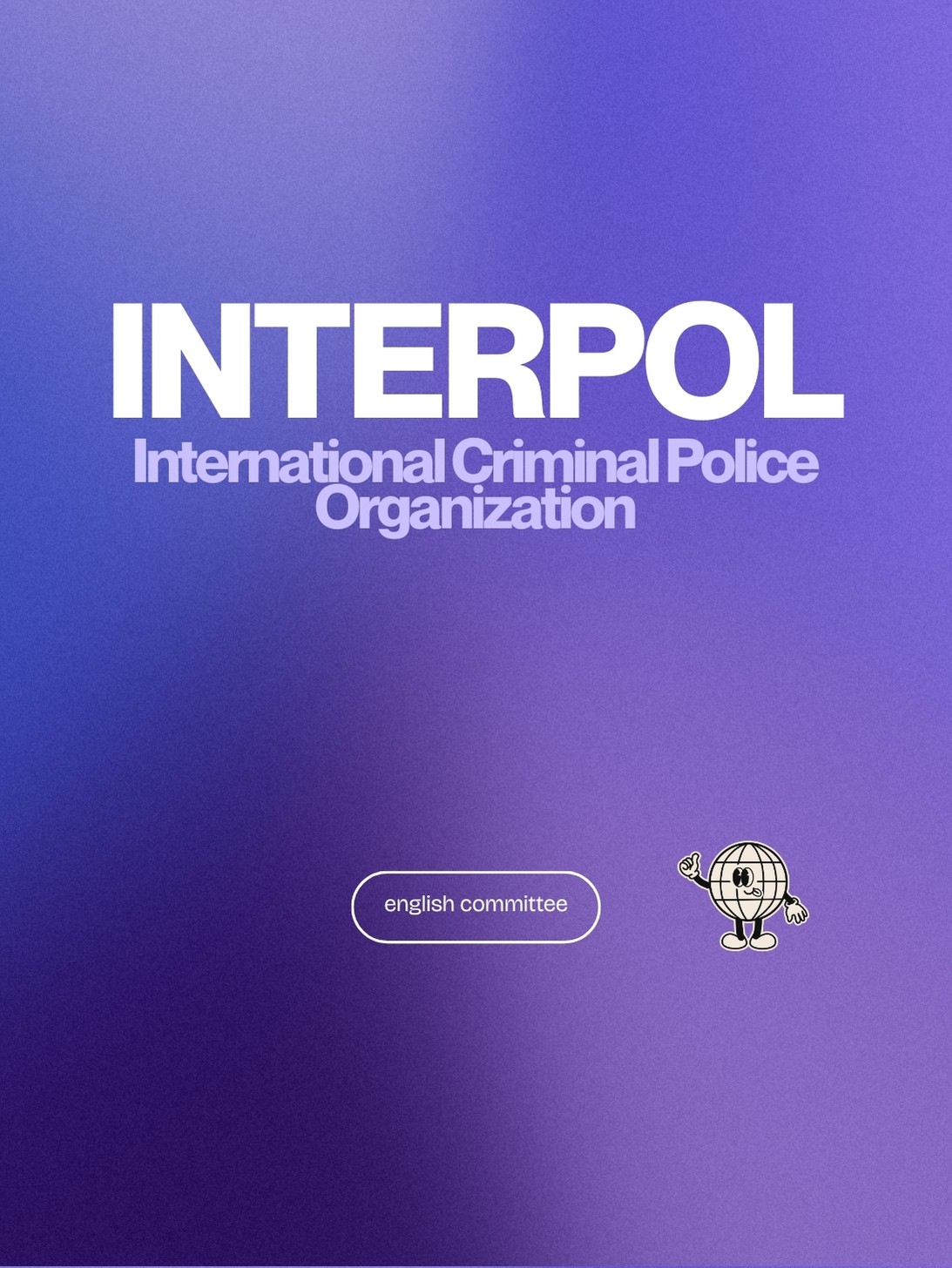 A smiling man in a suit and glasses sits at a table, with a modern office backdrop.