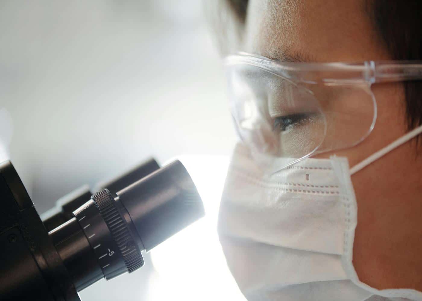 What is Retatrutide? Scientist looking at a microscope