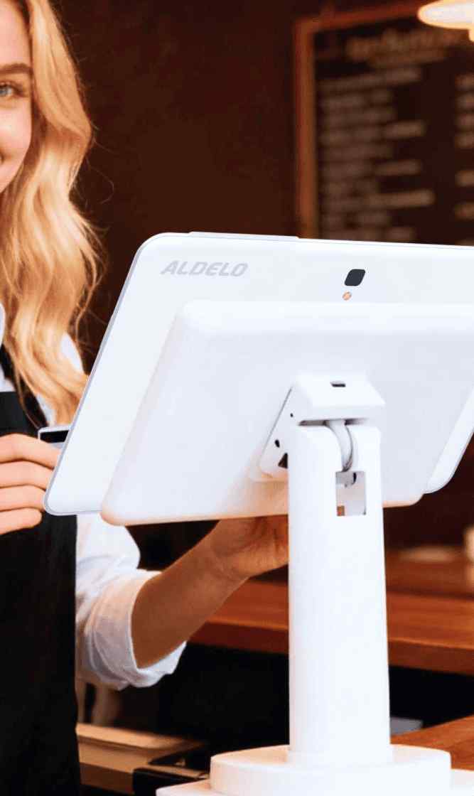 The staff member is operating the Aldelo Express - Restaurant POS.