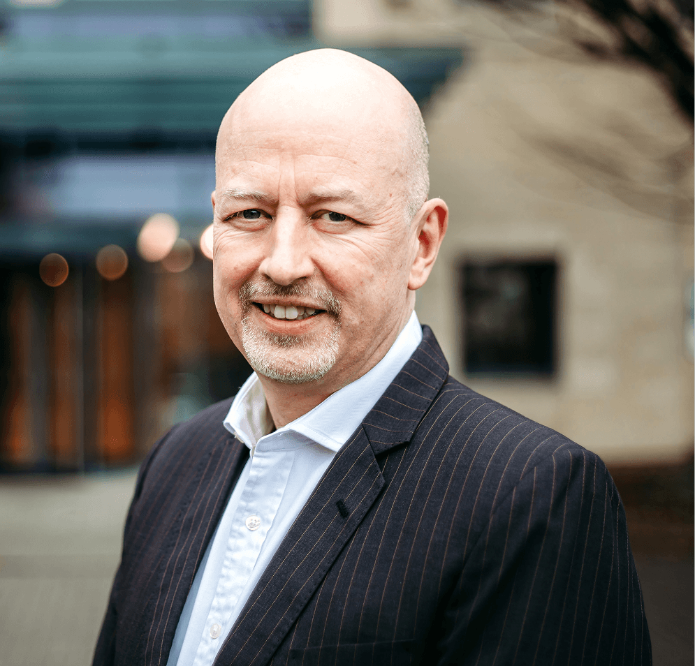 dr adam friedmann wearing a suite