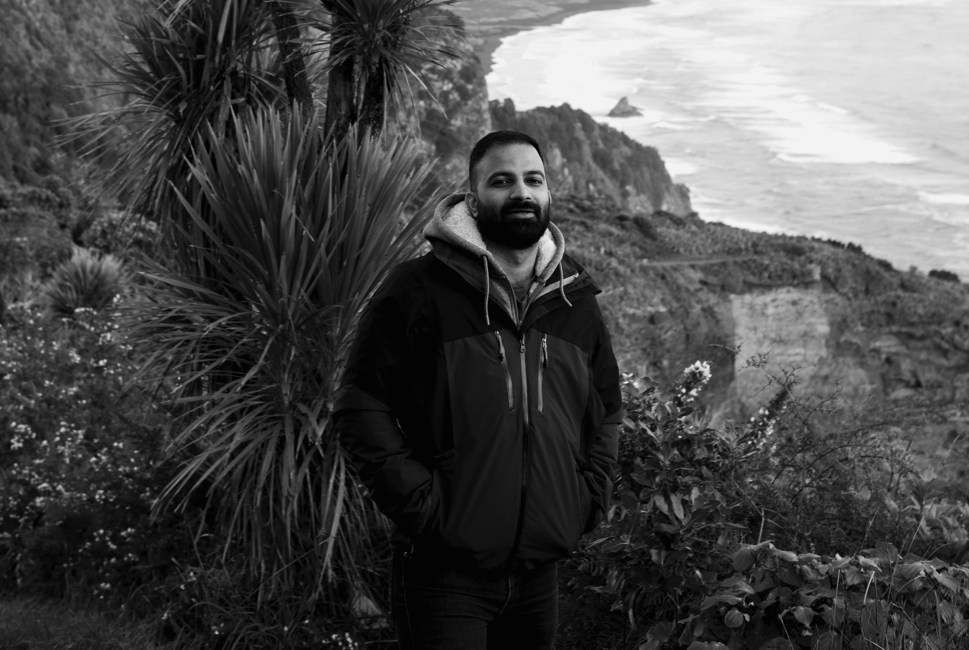 man standing in front of window