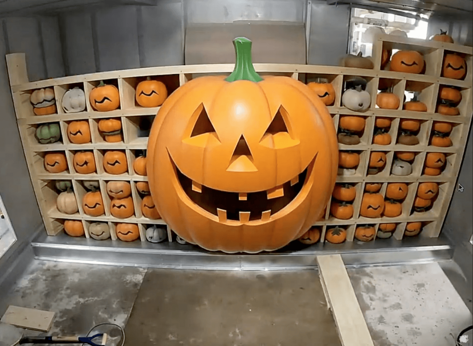 Halloween pumpkin display inside a mechanical room at GRR Cooling Experts.