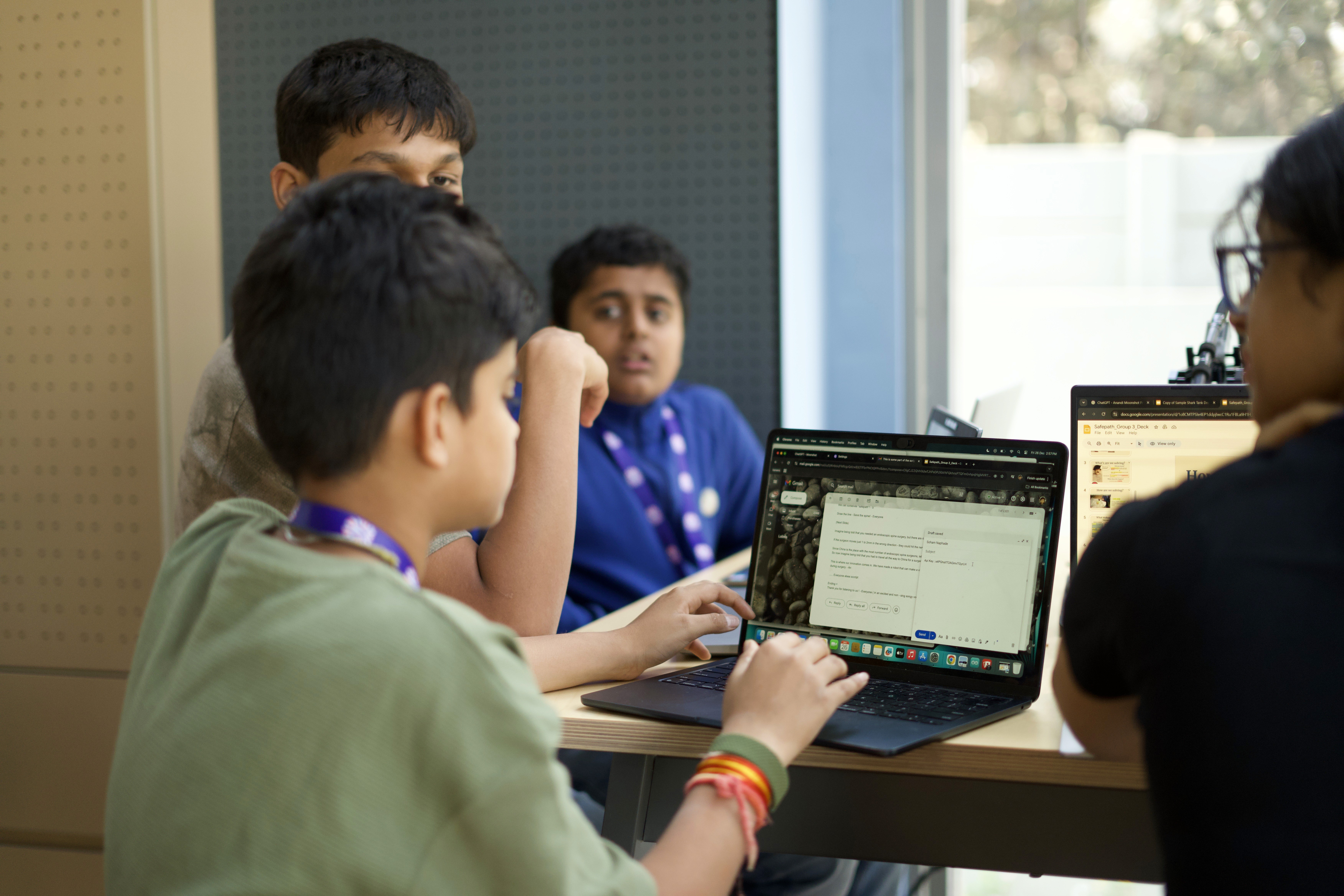 IB students draft emails using AI assistance