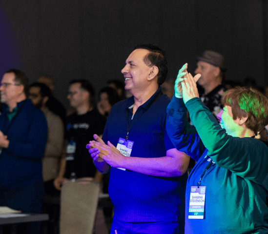 A Man Talking using Microphone in the Conference Room