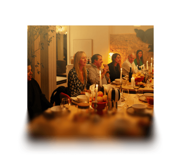 a group of people at a dinner table