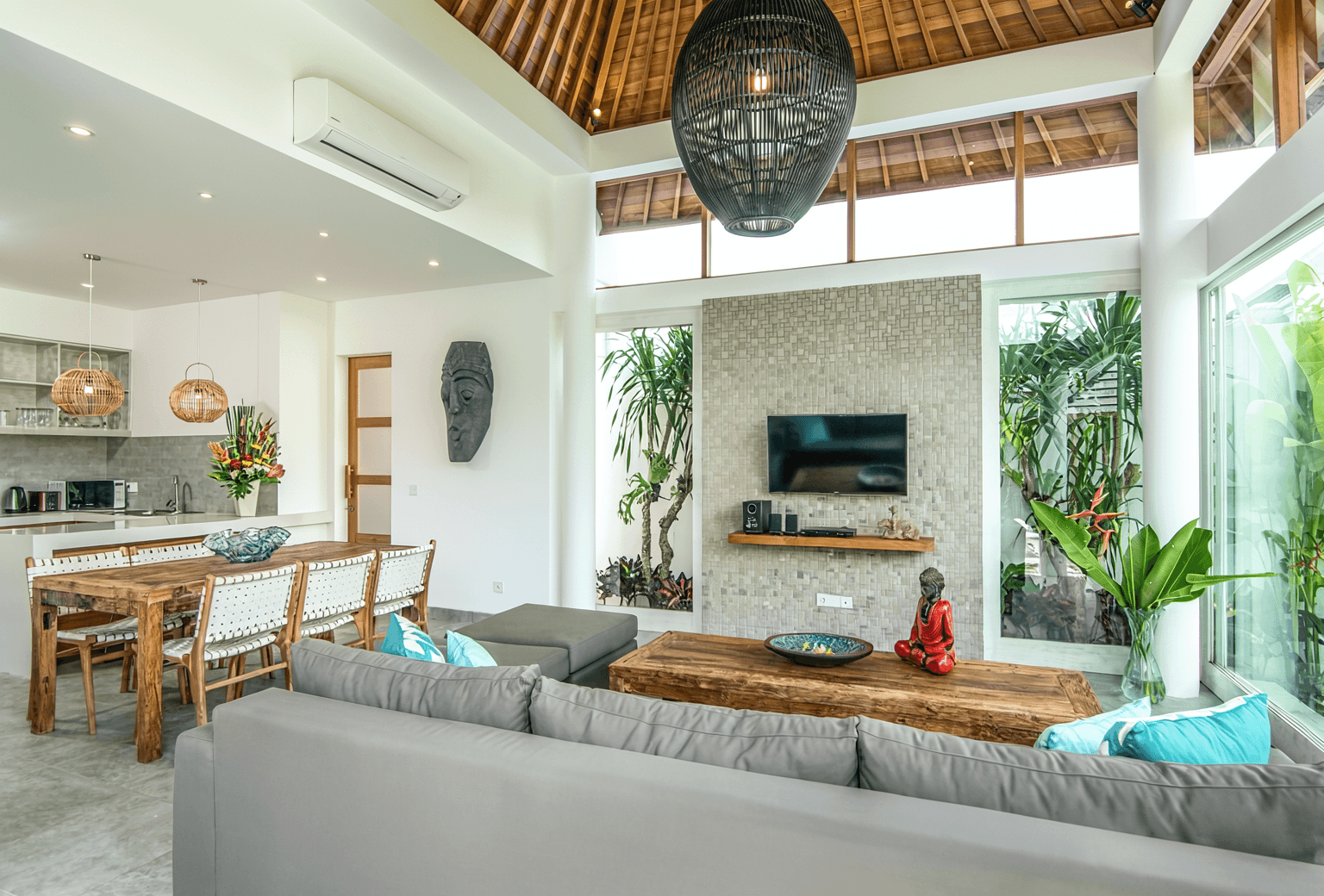 Spacious open-plan living and dining area in Canggu. Expert real estate services for luxury property buyers in Bali.