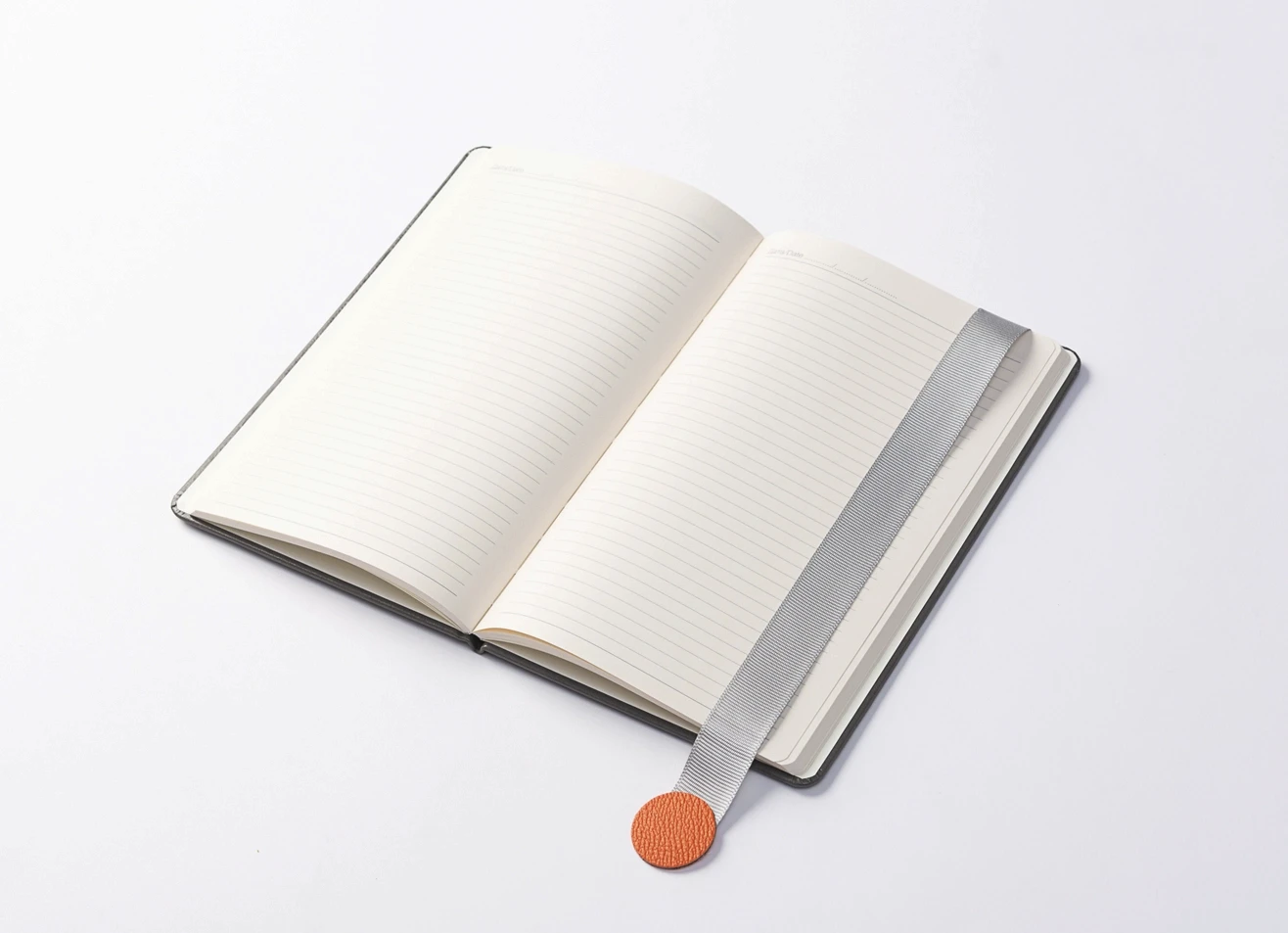 Custom branded magnetic closure journal with rounded corners and paper pocket.