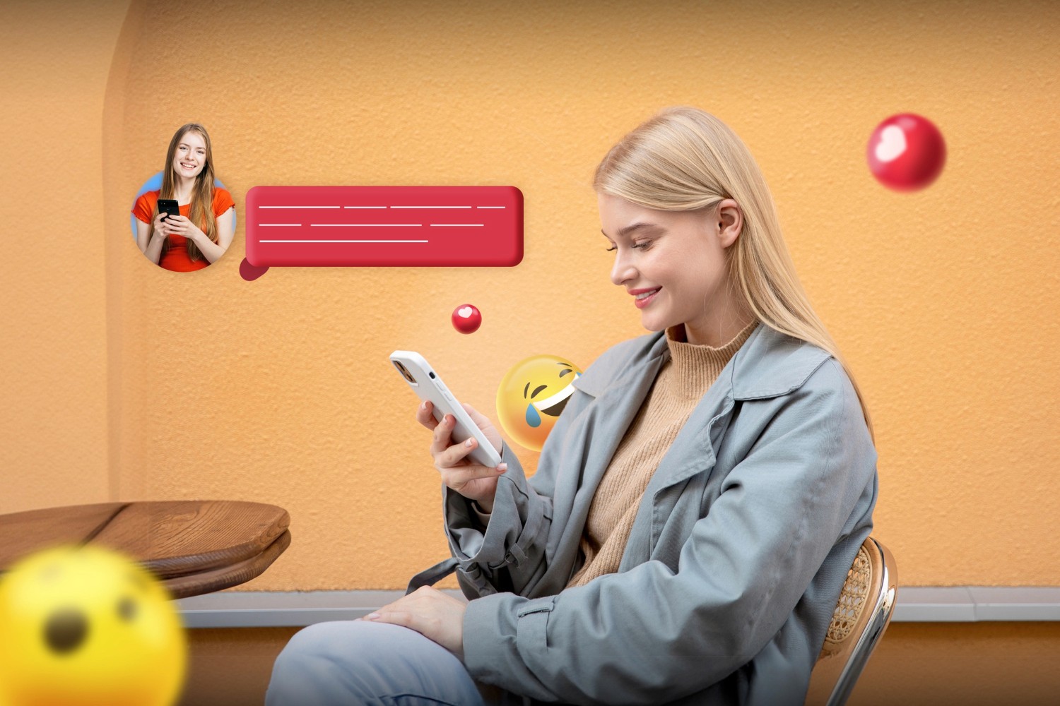 A woman gazes at a smiley face on her phone, engaged and smiling as she interacts with the screen.