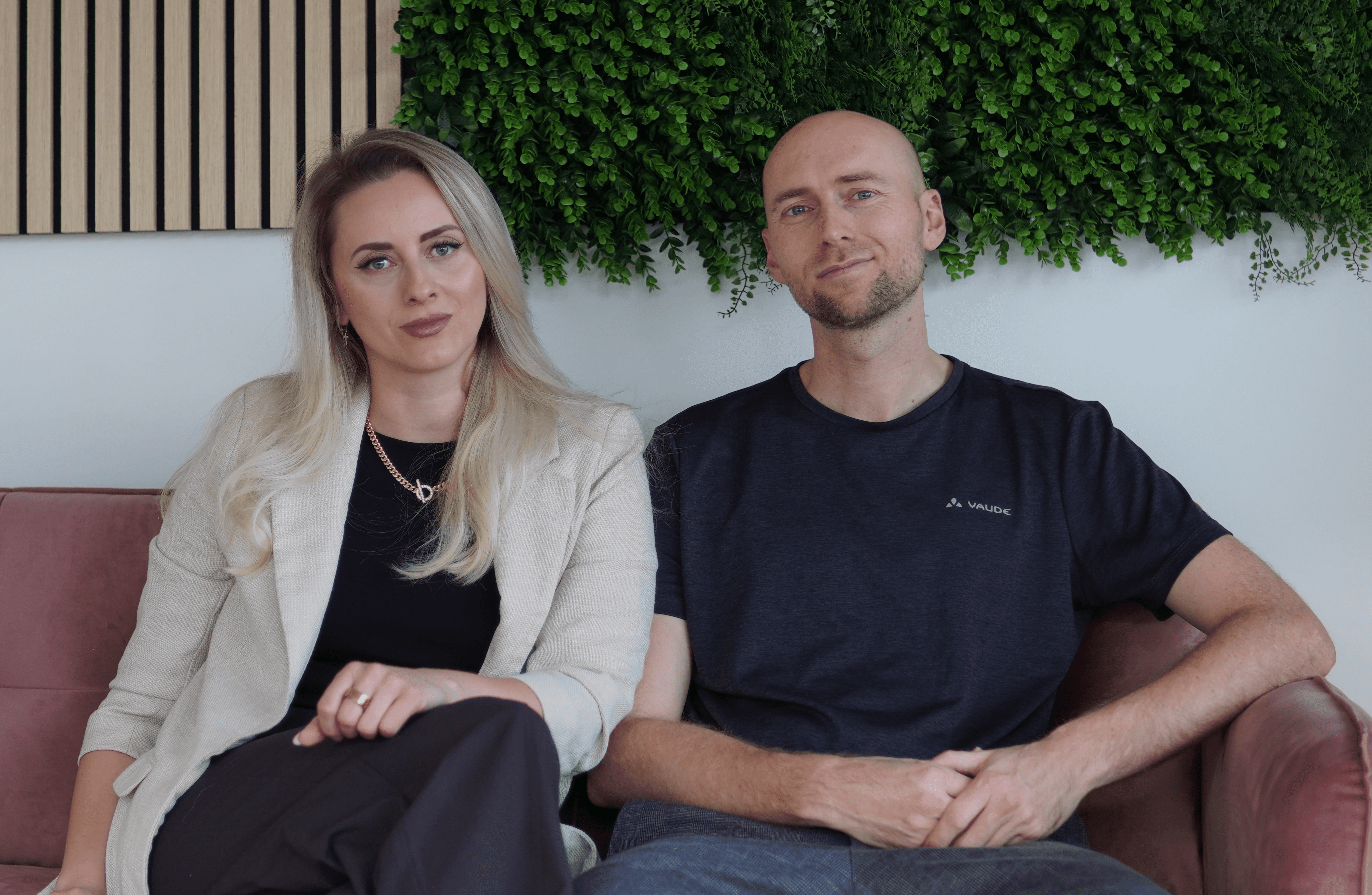 A smiley boy holds a table