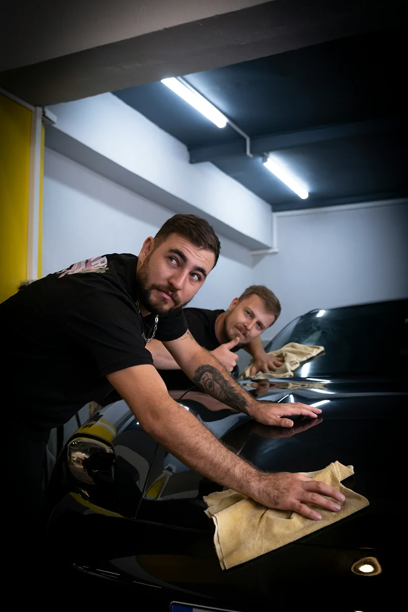 HyperAuto Care Ceramic Coating service process in a professional auto care workshop