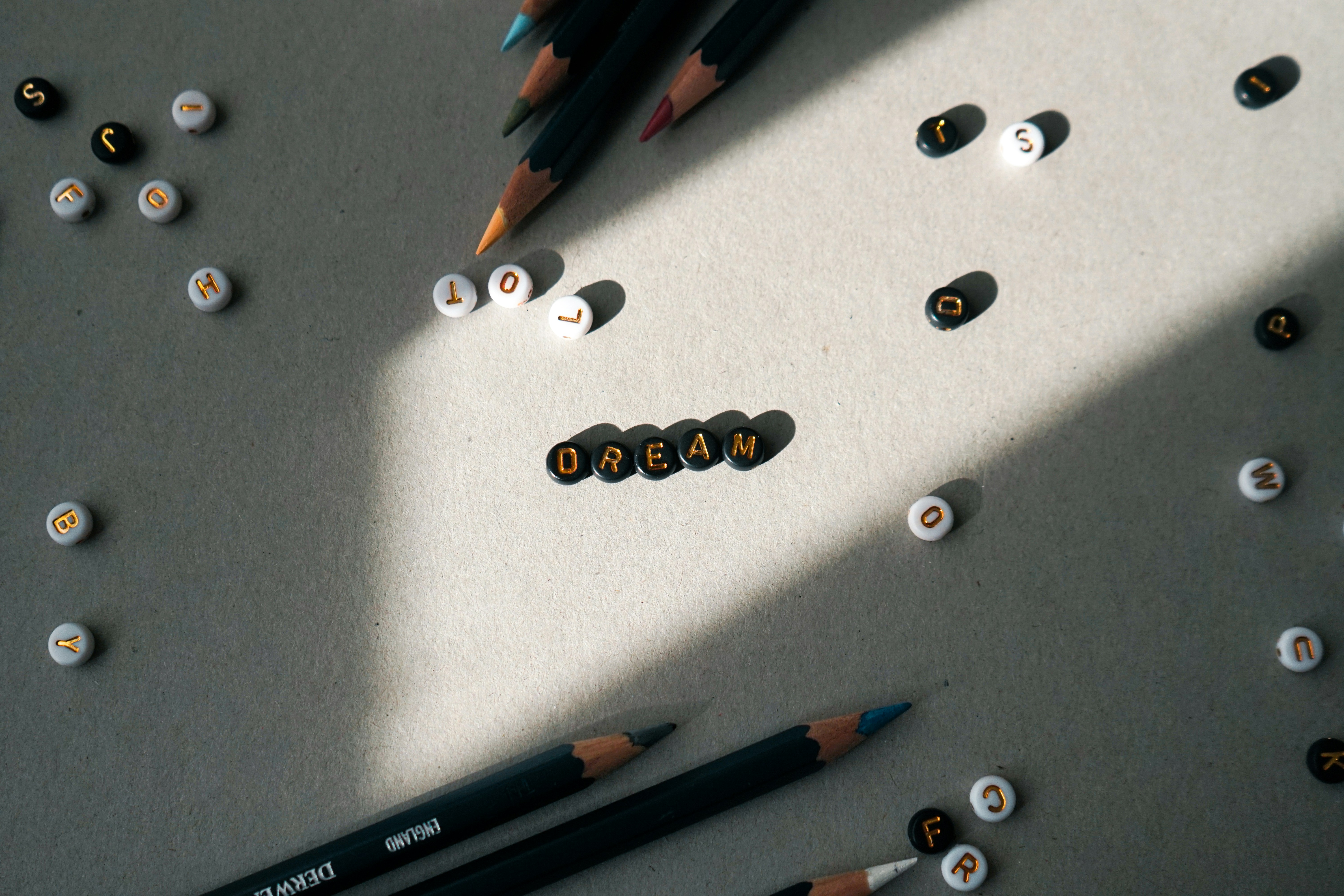 A group of pencils sitting on top of a table