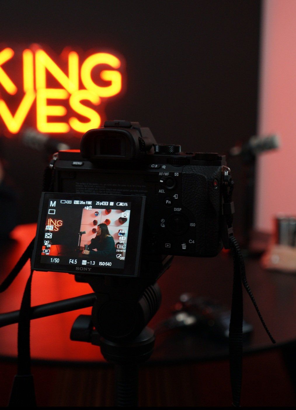 grayscale photo of people walking towards building