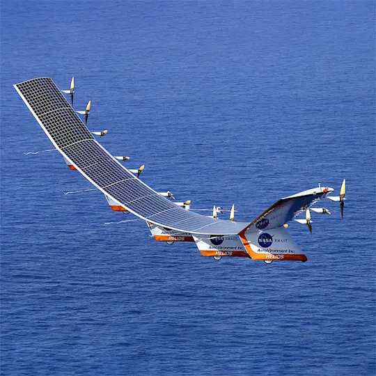 Solar-powered airplane over open sky