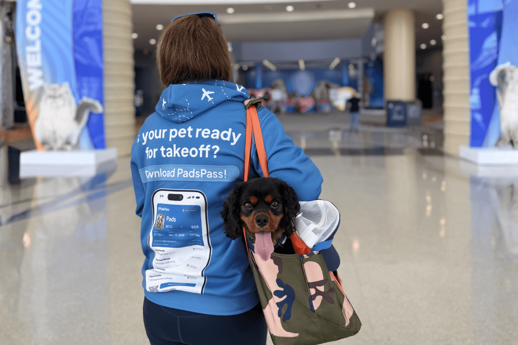 Lauren carrying Peru in the Out-and-About Pet Tote Pro Edition