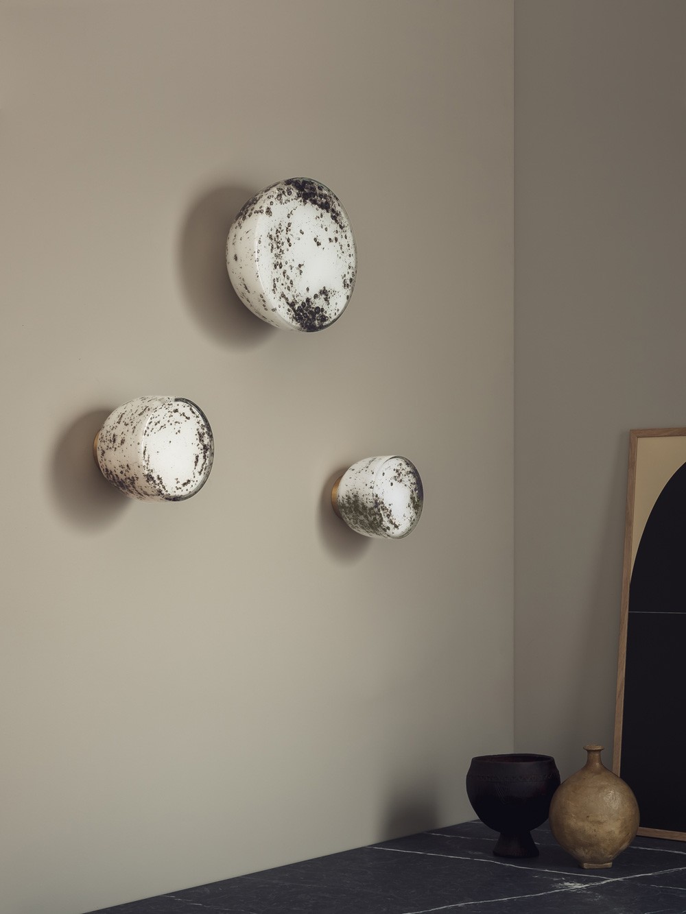Orla wall lights – flat-faced glass with volcanic frit patterning