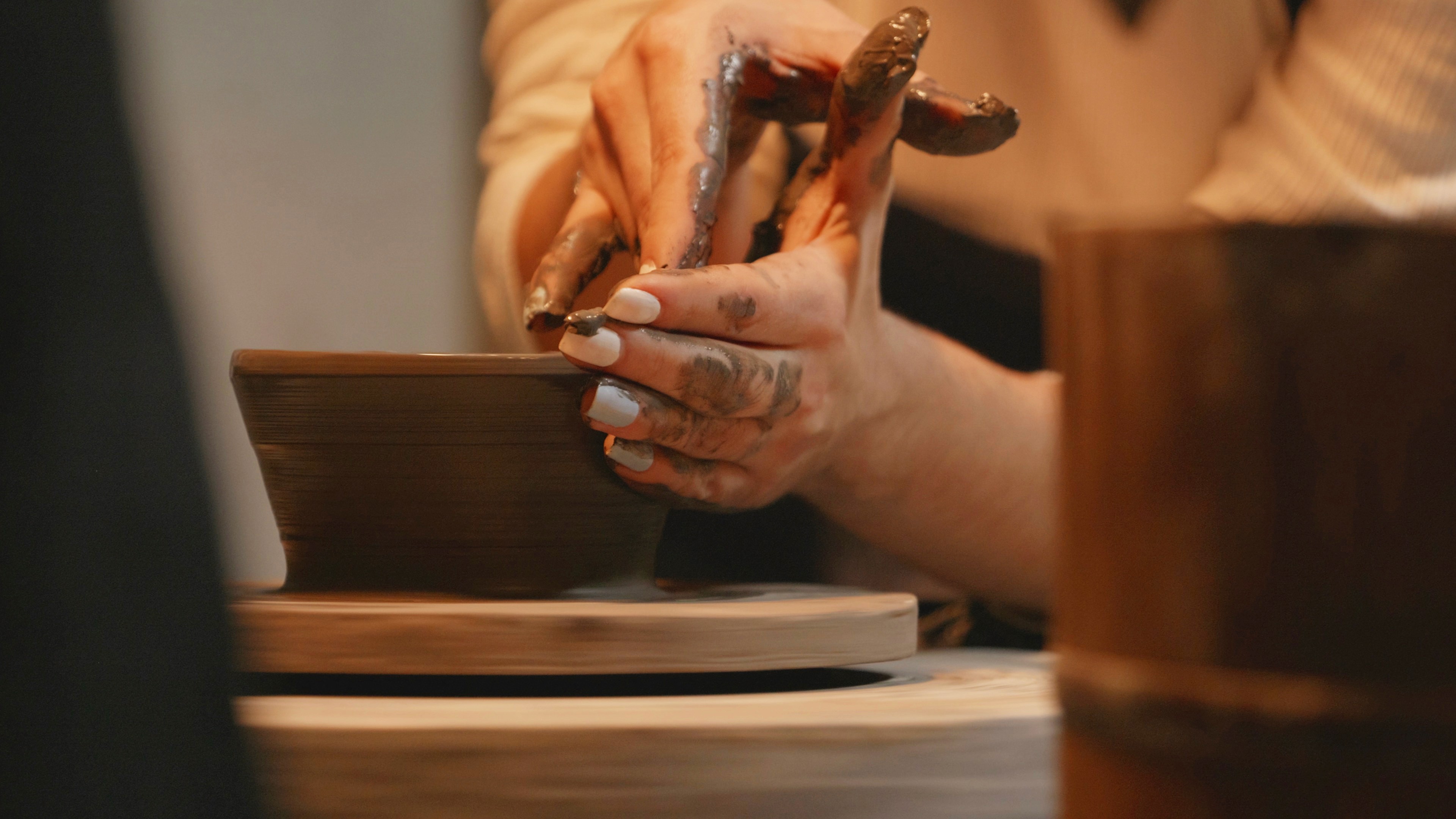 Visitor trying their hand at making a Bizen ware rice bowl