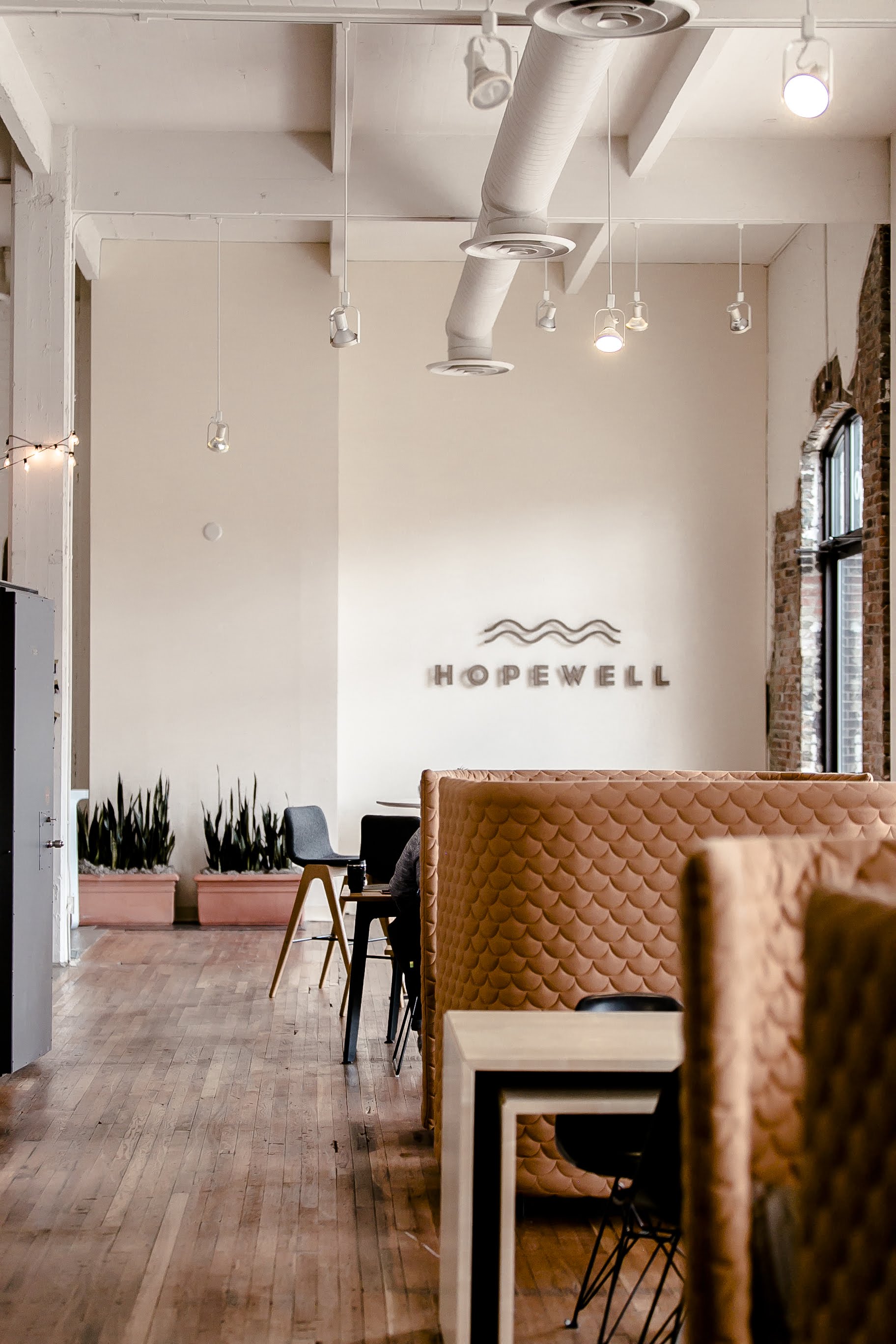 person sitting in a chair in front of a man