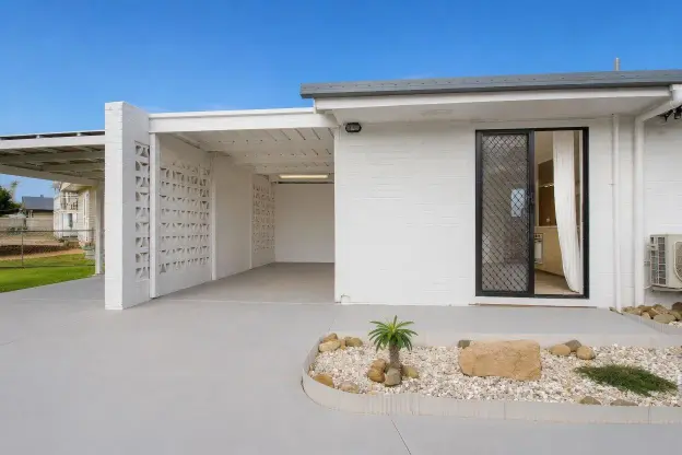 Freshly painted white brick home exterior in Brisbane