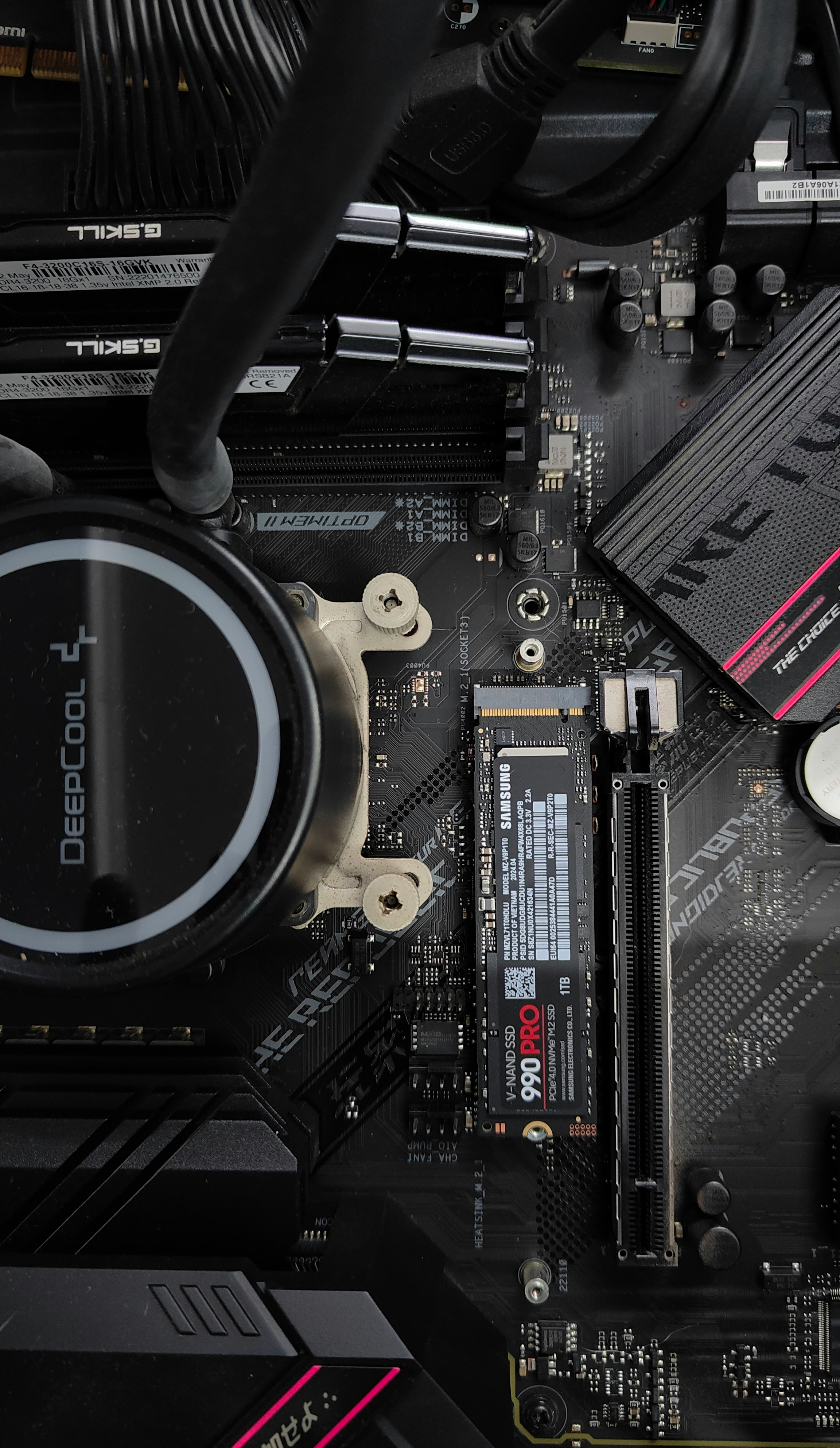 Computer motherboard with cpu cooler and ssd.