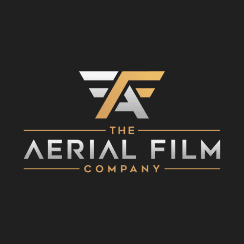 Man and two girls taking a selfie in a tent