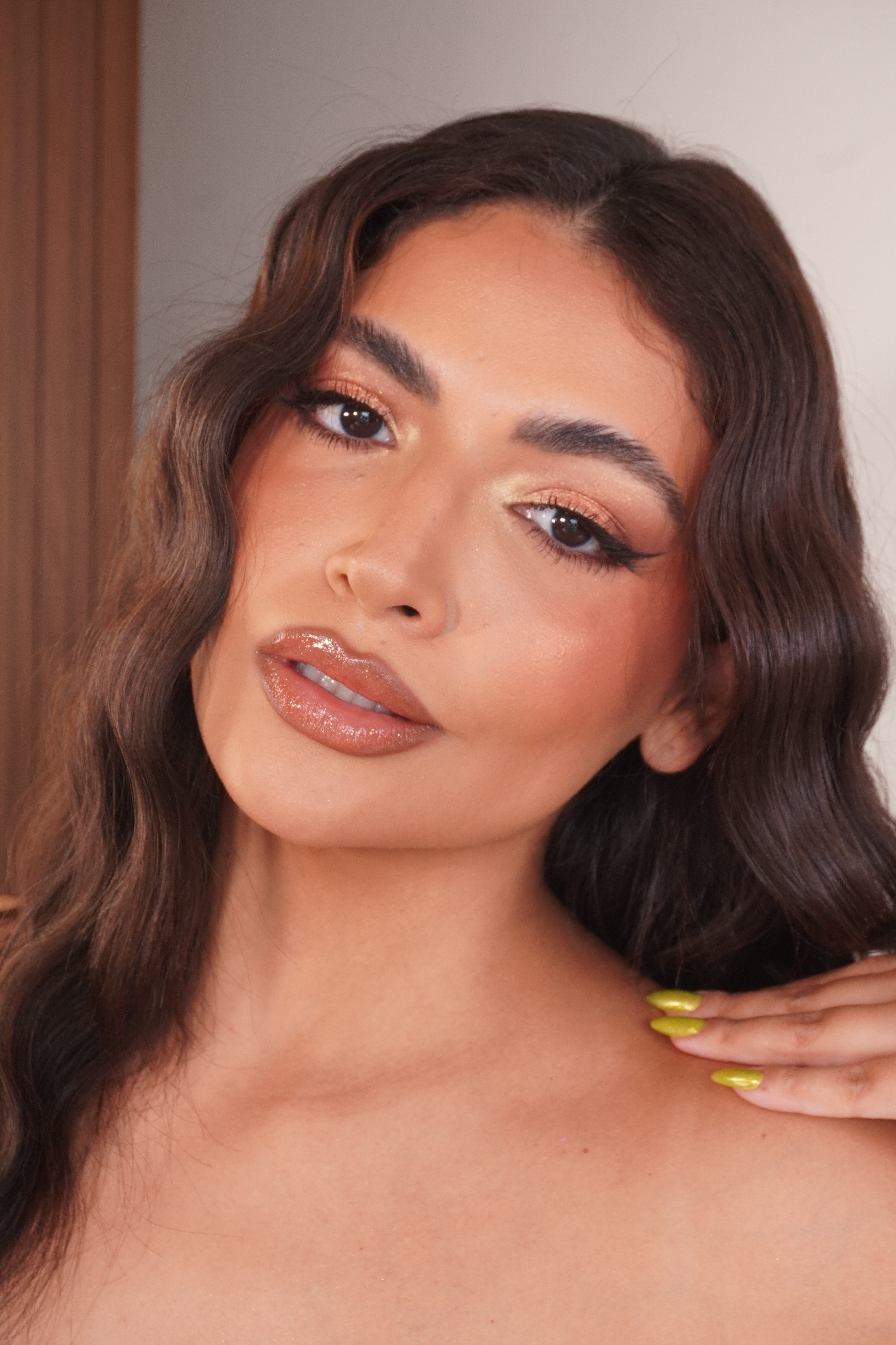 Beautiful lady with a ray of sunlight shining on her face