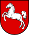 Wappen des Bundeslandes Niedersachsen: Weißes springendes Pferd auf rotem Schild.