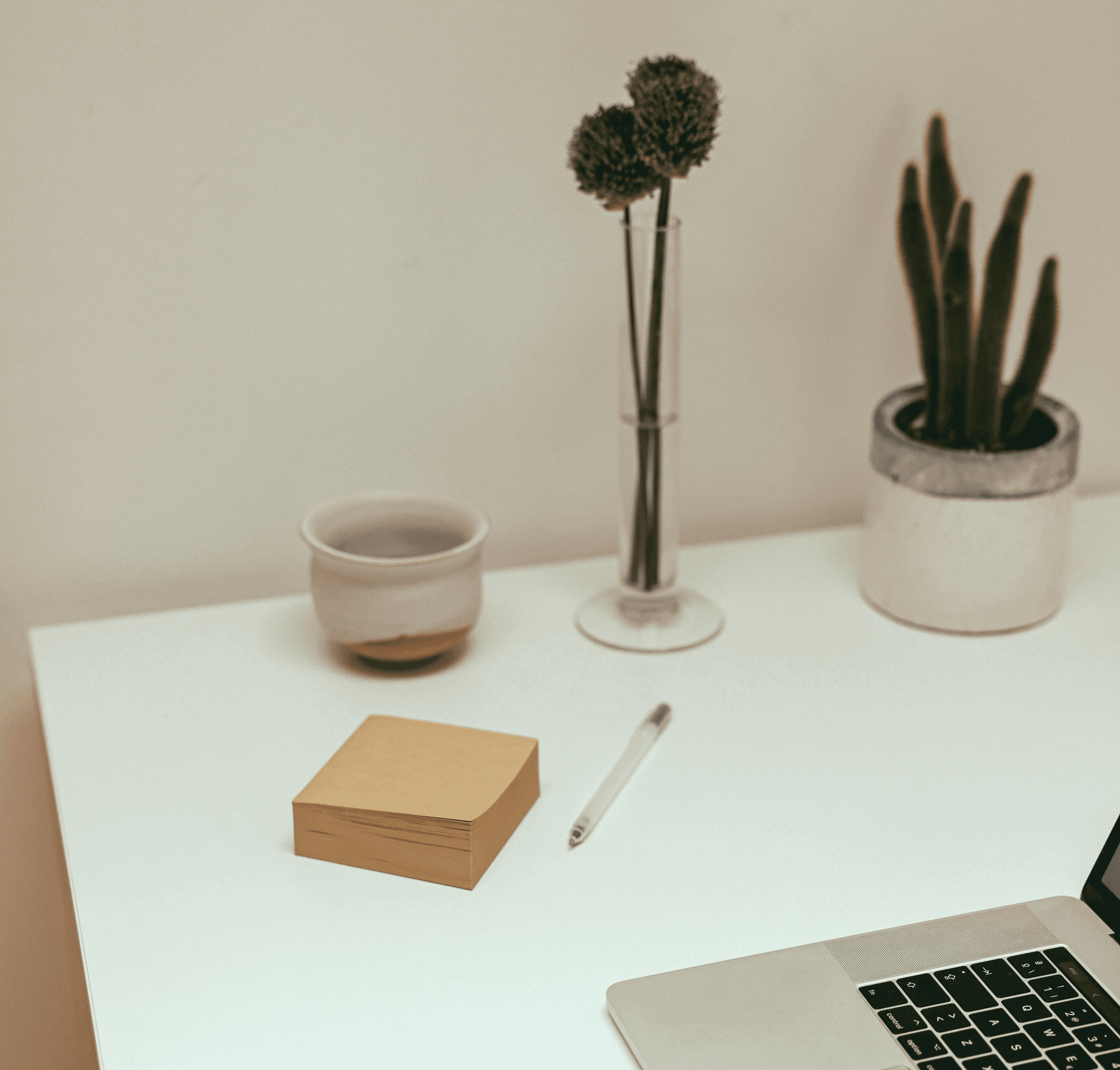 Elf woman in white dress raising hands by the river