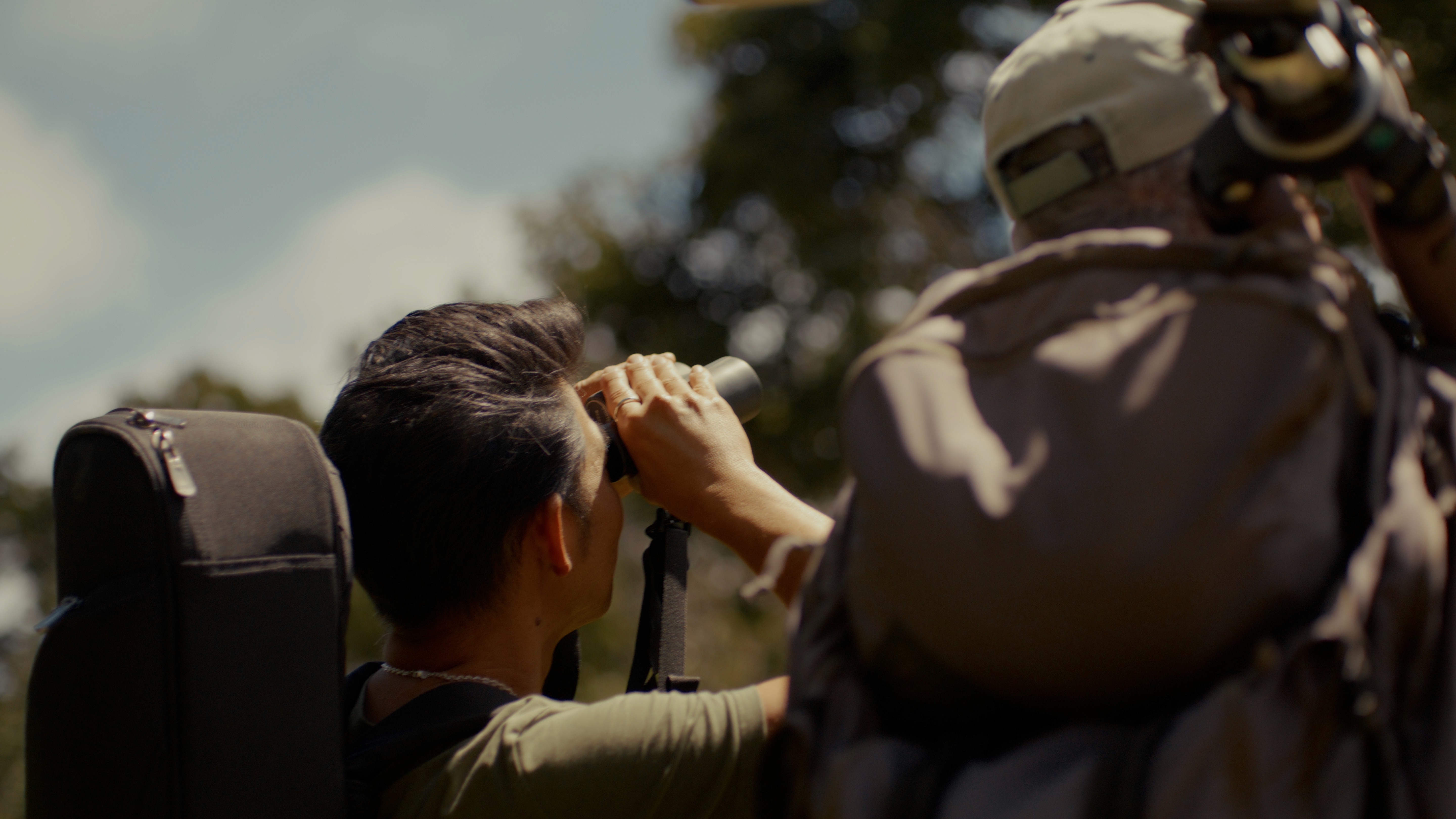 Streetside billboard with flyposters of the Batch.Works brand and illustrations