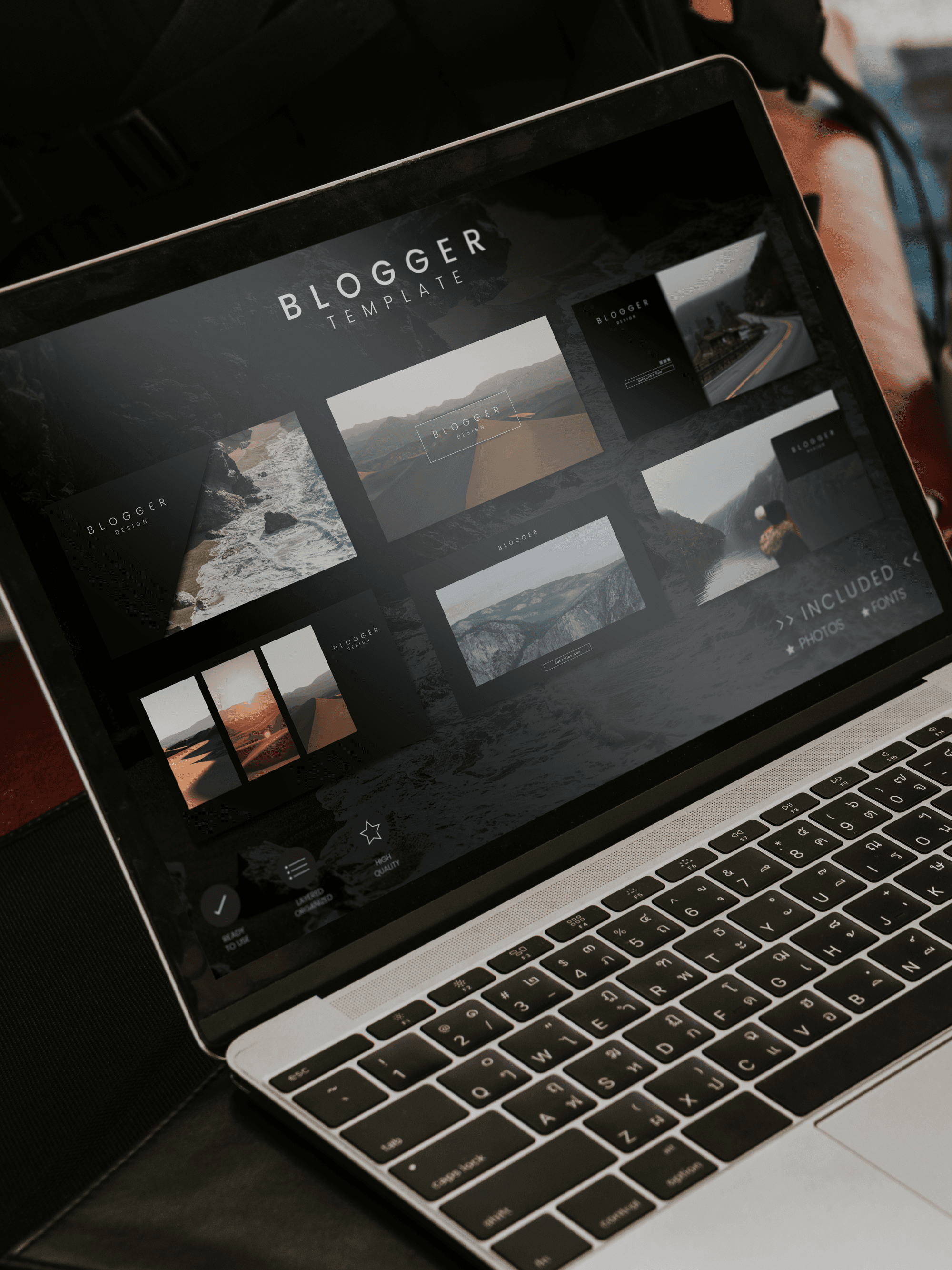 A laptop displaying a modern, minimalist "Blogger Email Template" design on its screen.