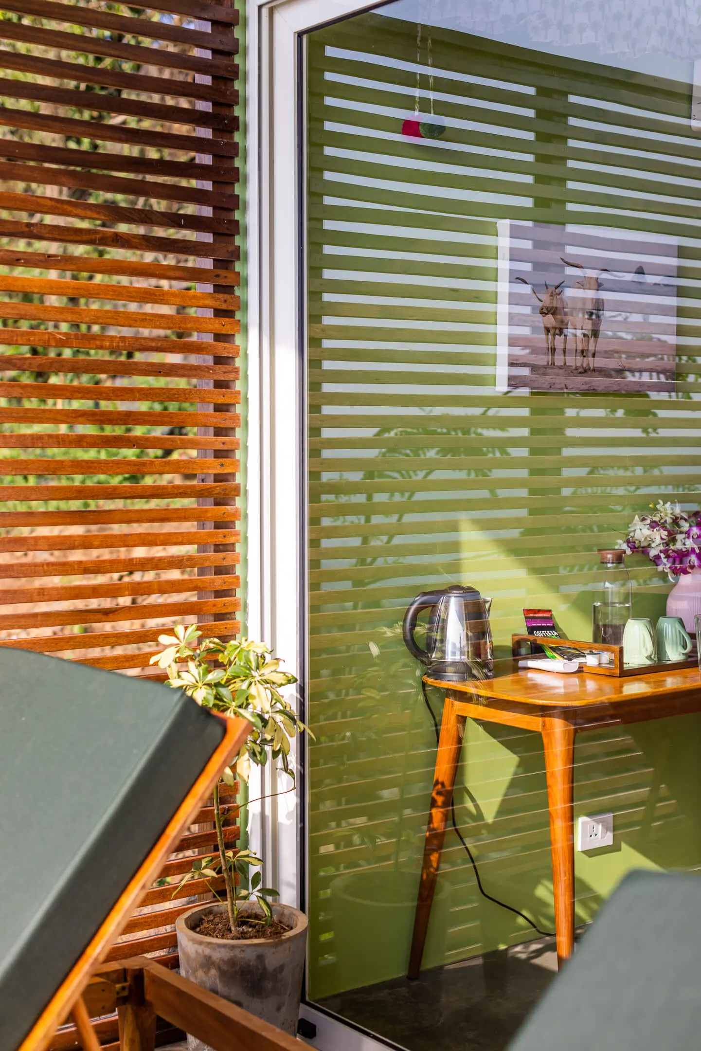 Grand Sea View Room 9 at Casa Jaali — tea corner behind the slatted screen