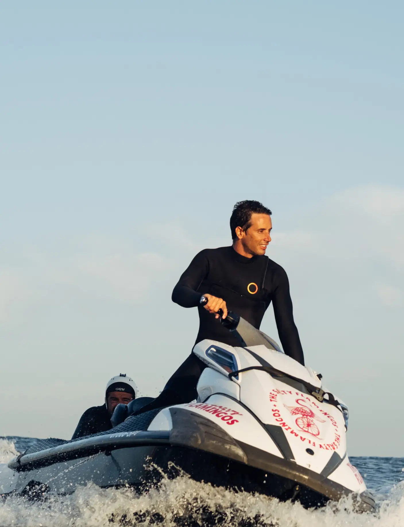 photography of man riding personal jet ski during daytime