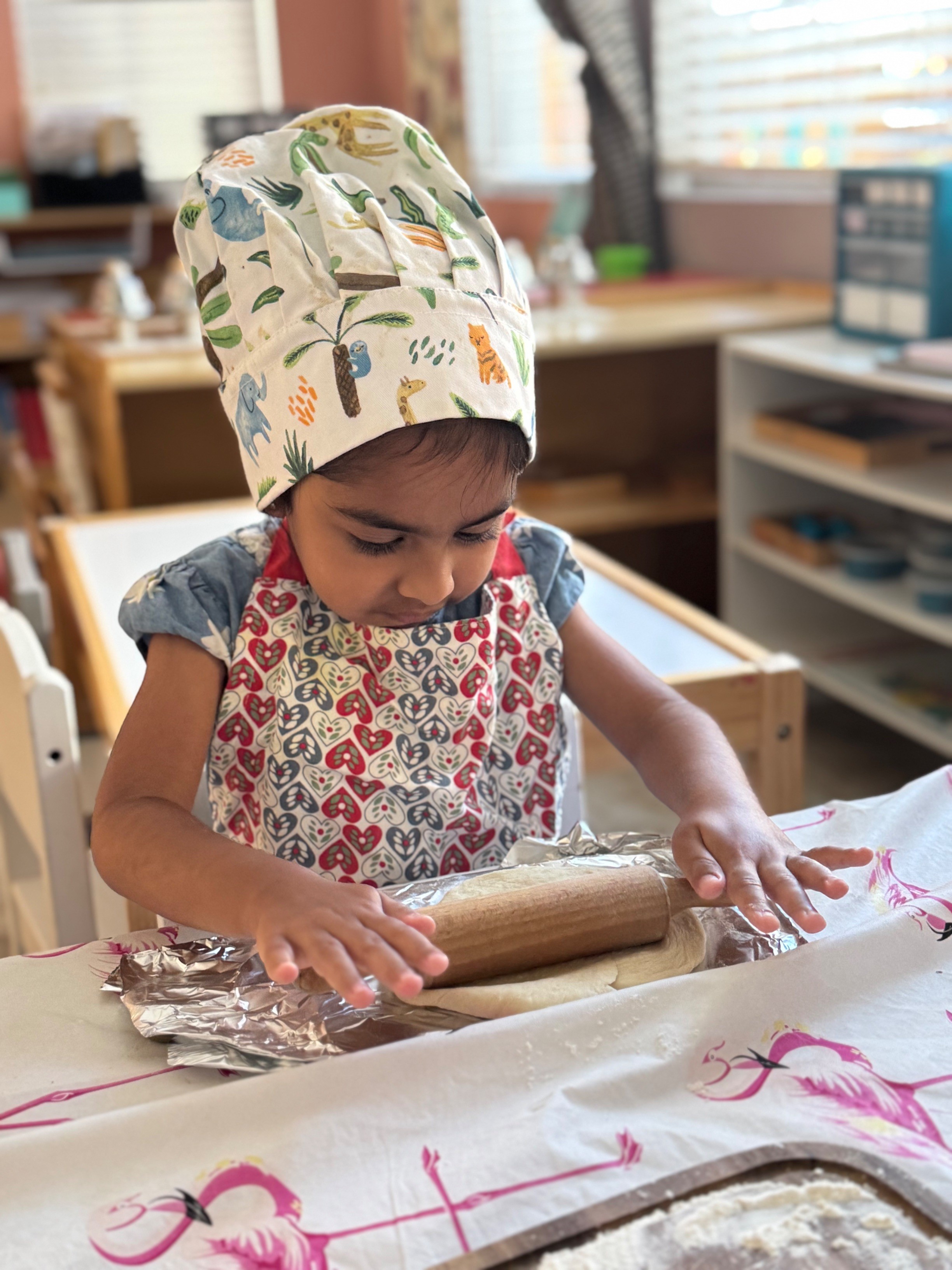 Child working independently in a small in-home Montessori school in Irvine, California