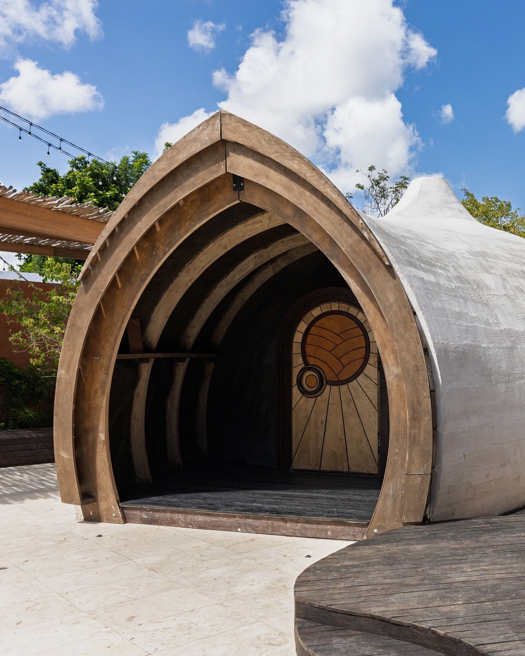 Aerial view of a lush green island meeting turquoise waters