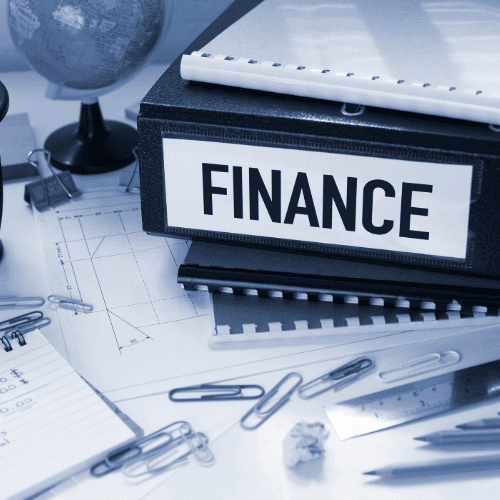 husband and wife working happily on a laptop