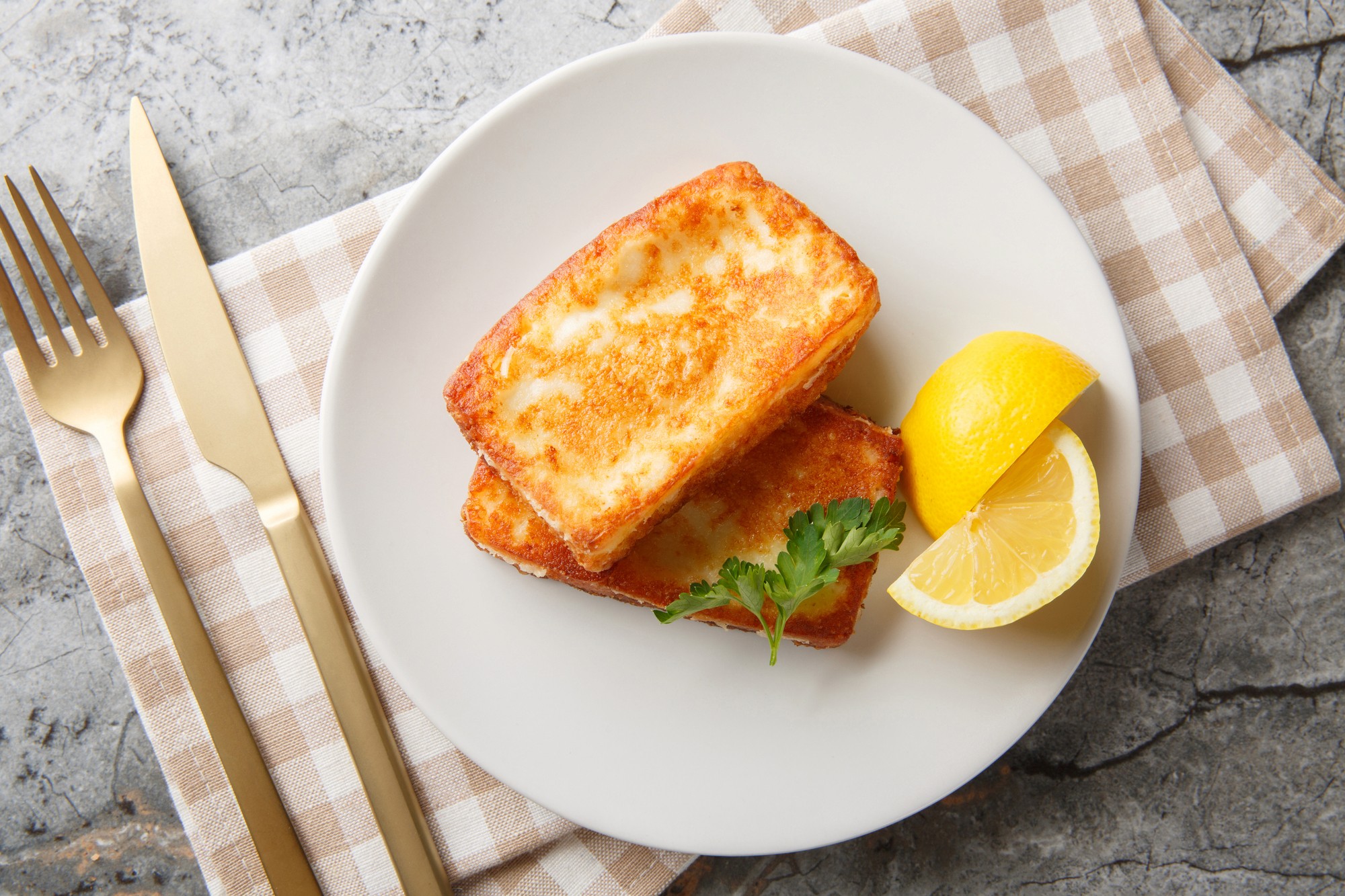 brown wooden spoon on white ceramic bowl