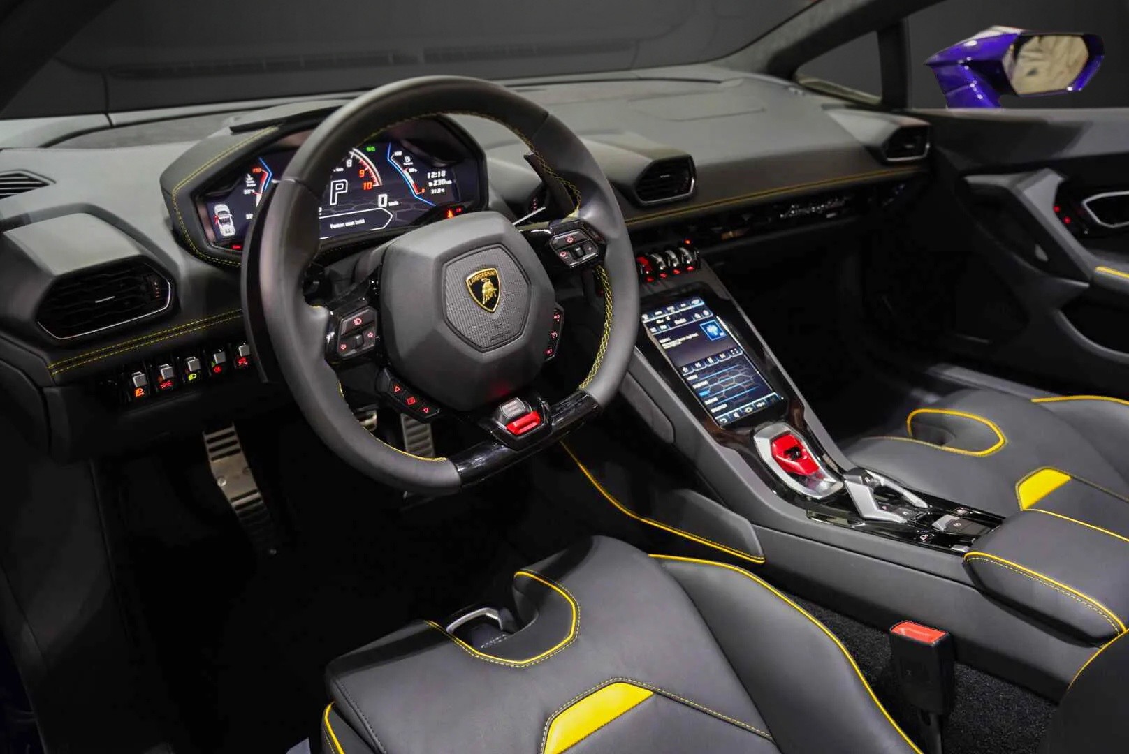 Interior of Lamborghini Huracan EVO Spyder RWD 2023 in purple, luxury supercar rental in Dubai