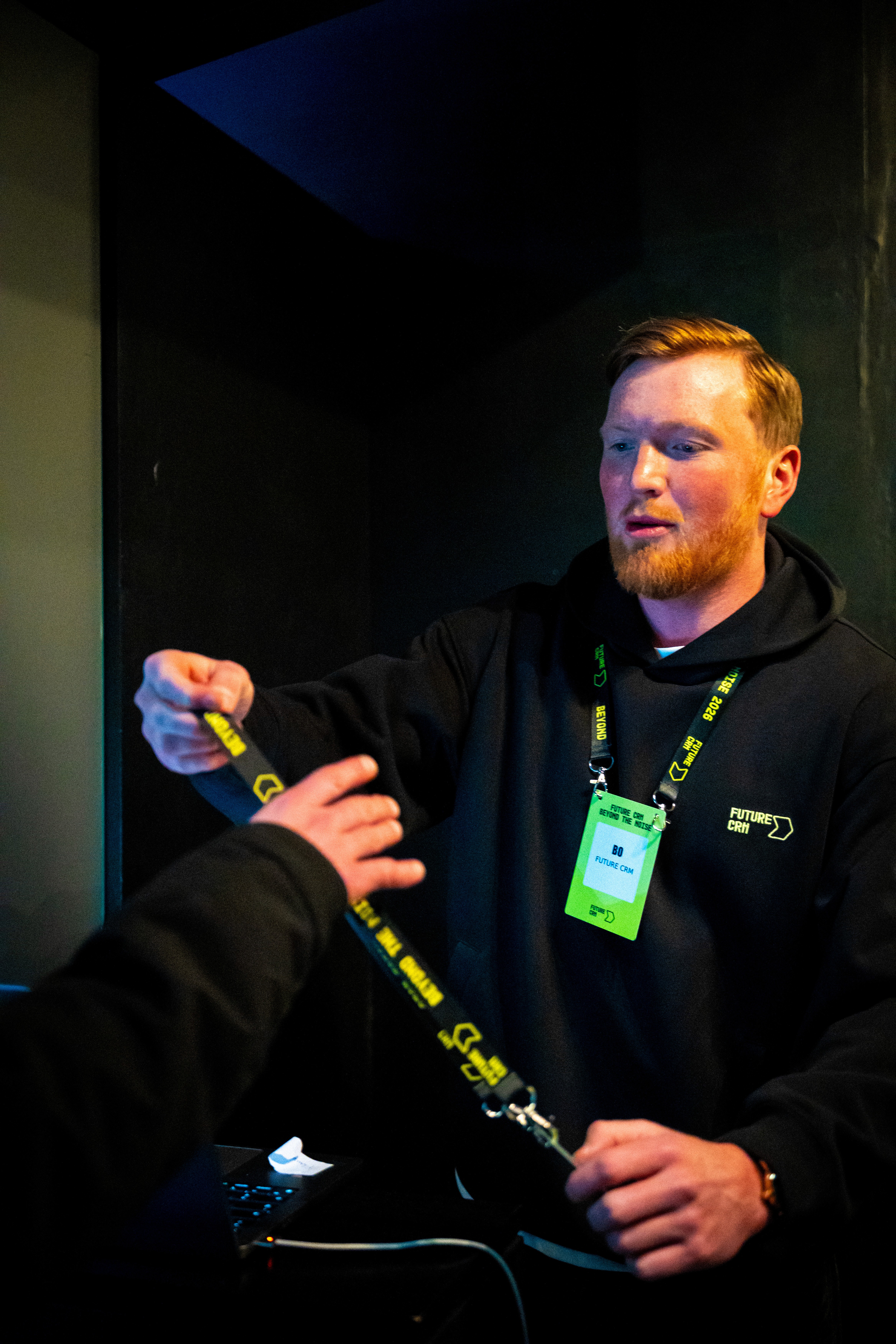 Guy handing out a band